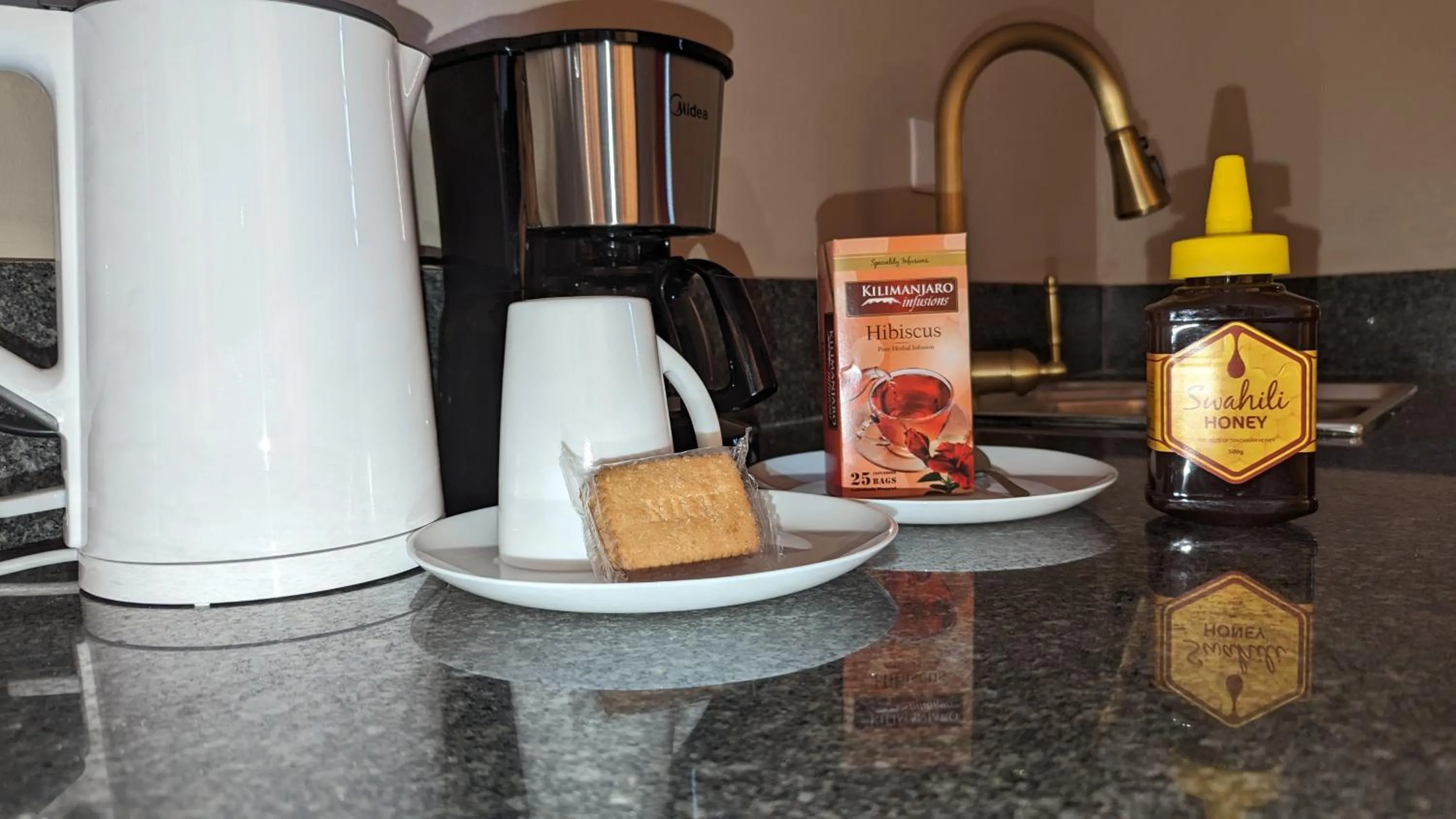 Kitchen or kitchenette in Mufasa city Hostel and Apartments