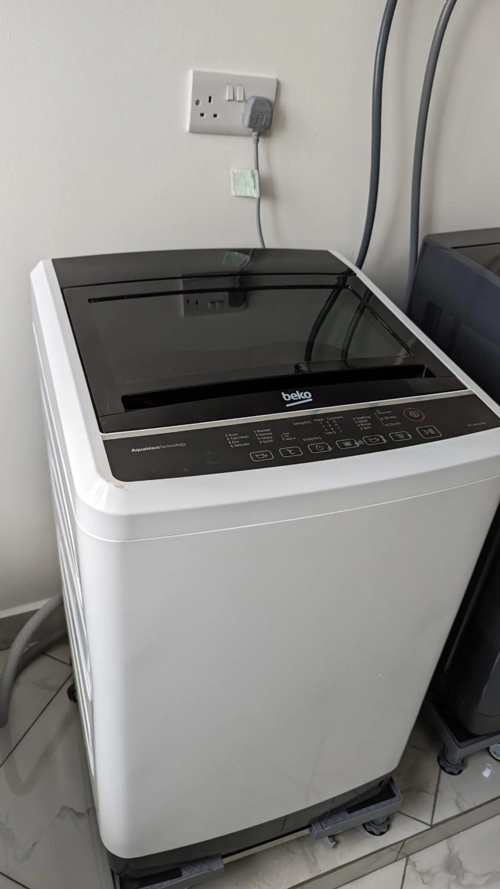 washing machine in Mufasa city Hostel and Apartments