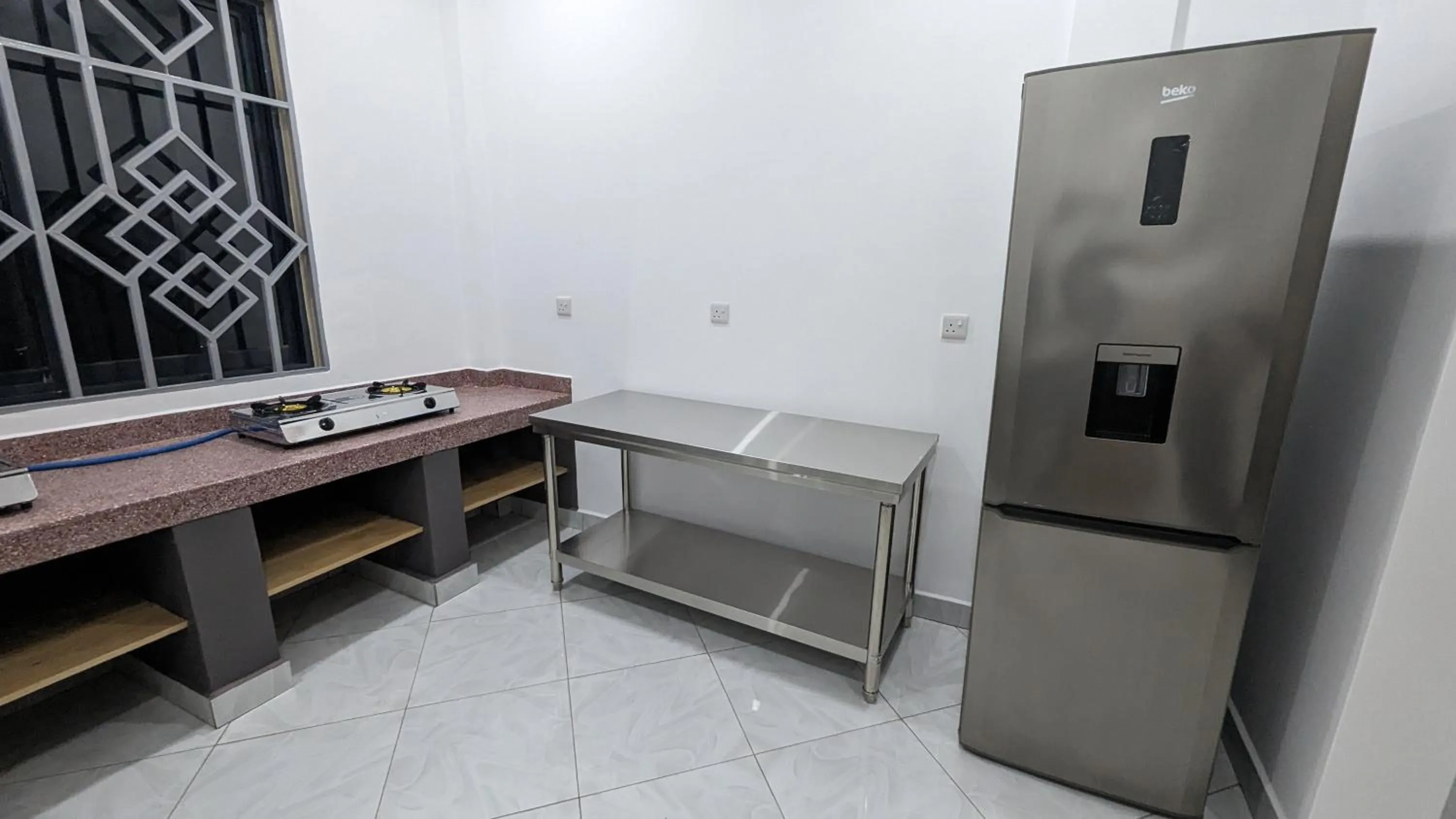 Kitchen or kitchenette in Mufasa city Hostel and Apartments