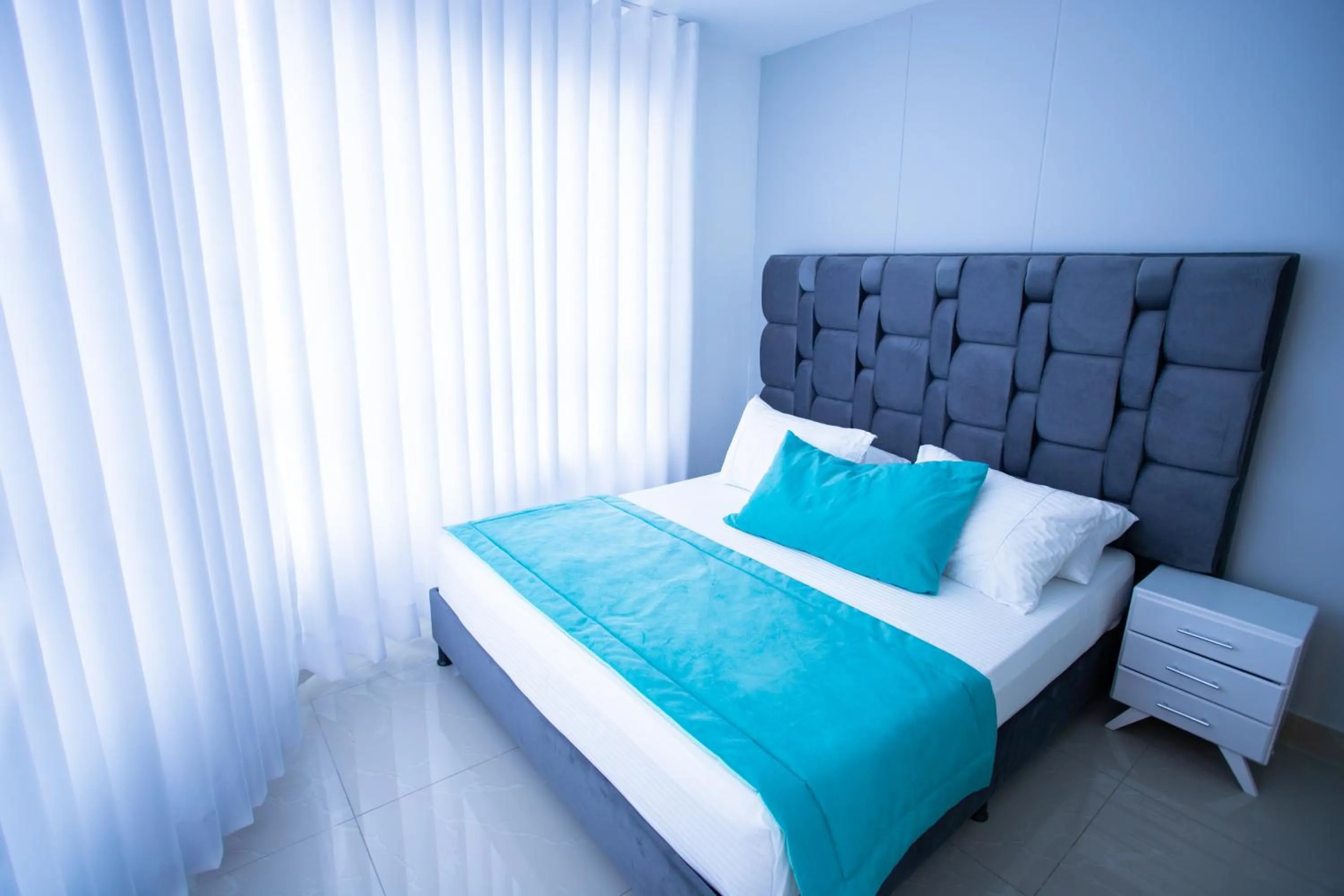 Bed in Street 55 Hotel