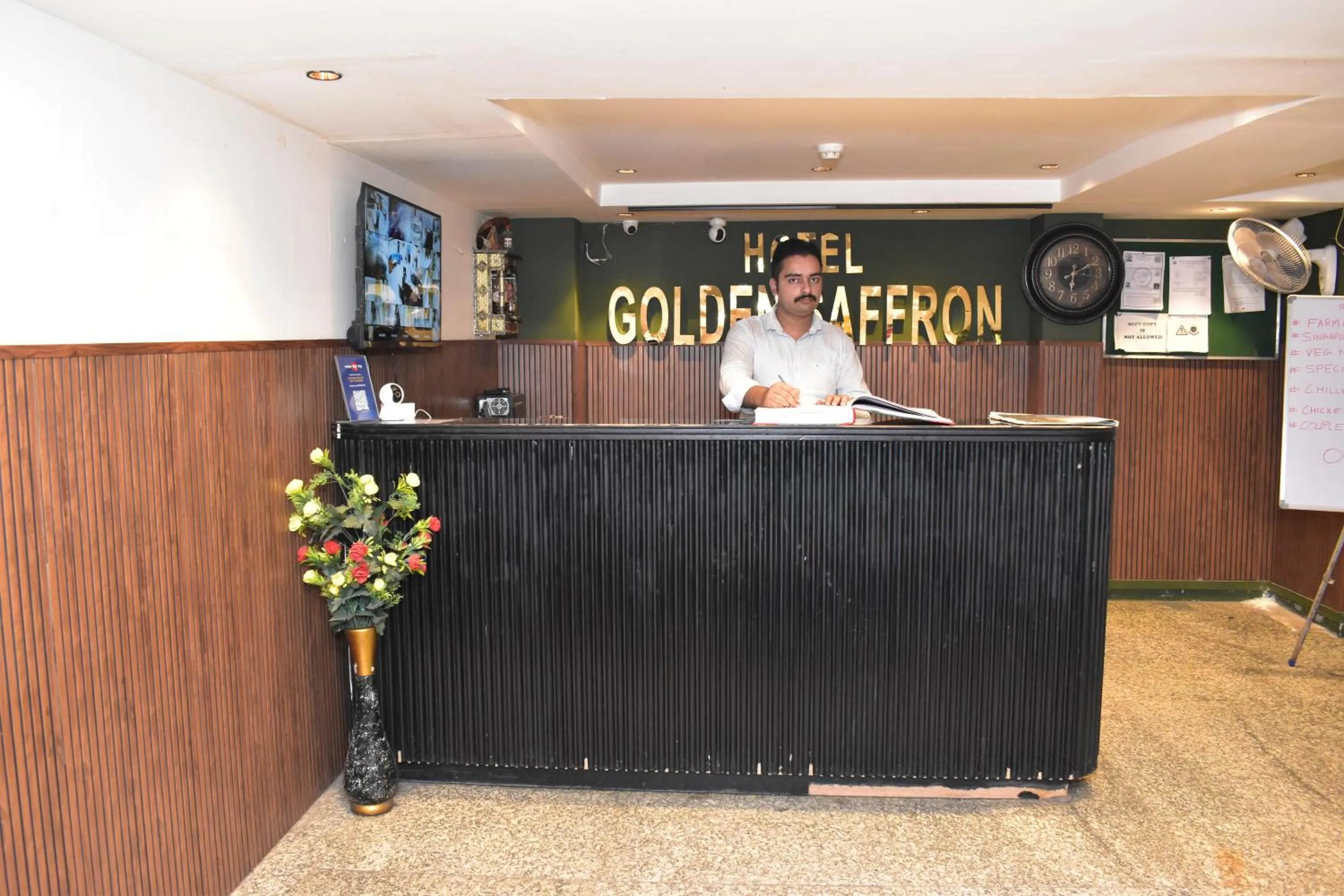 Property logo or sign in Qotel Comfort Golden Saffron Punjabi Bagh New Delhi