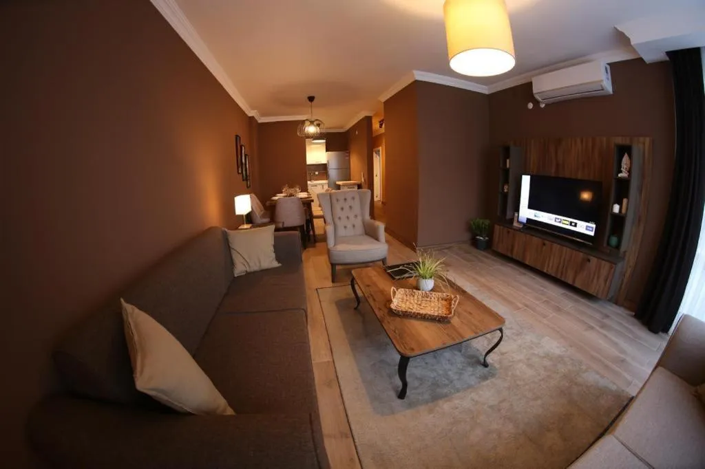 Communal lounge/ TV room in Yücemek Apart