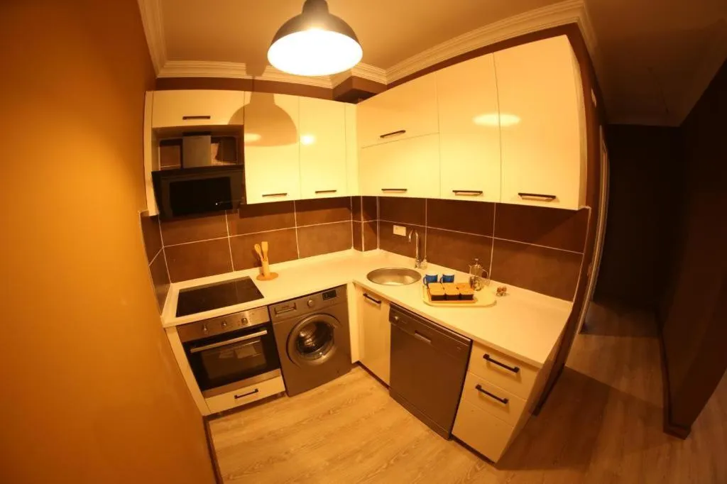 Kitchen or kitchenette in Yücemek Apart