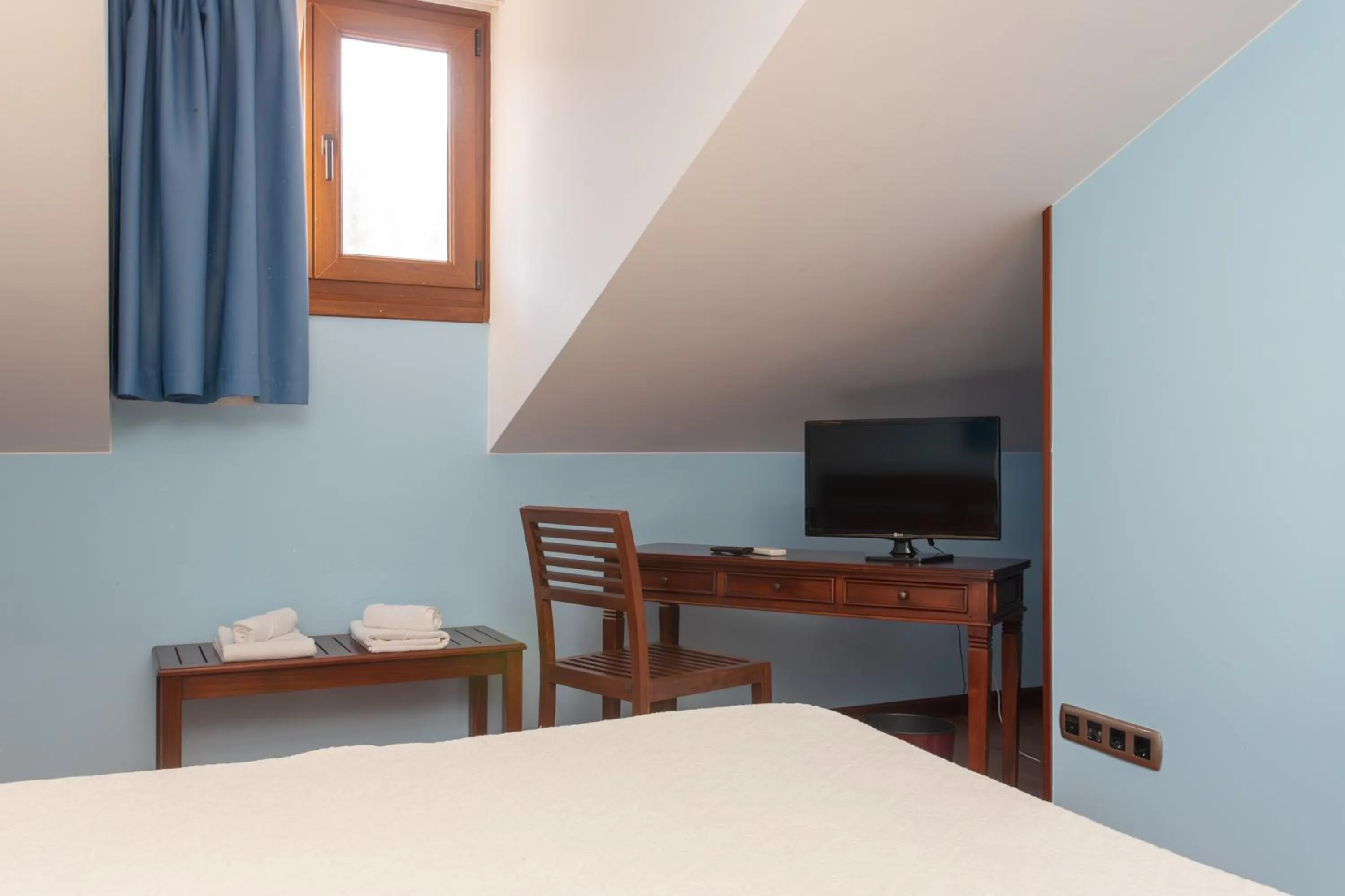 hair dresser, Bed in Hotel Bufon de Arenillas