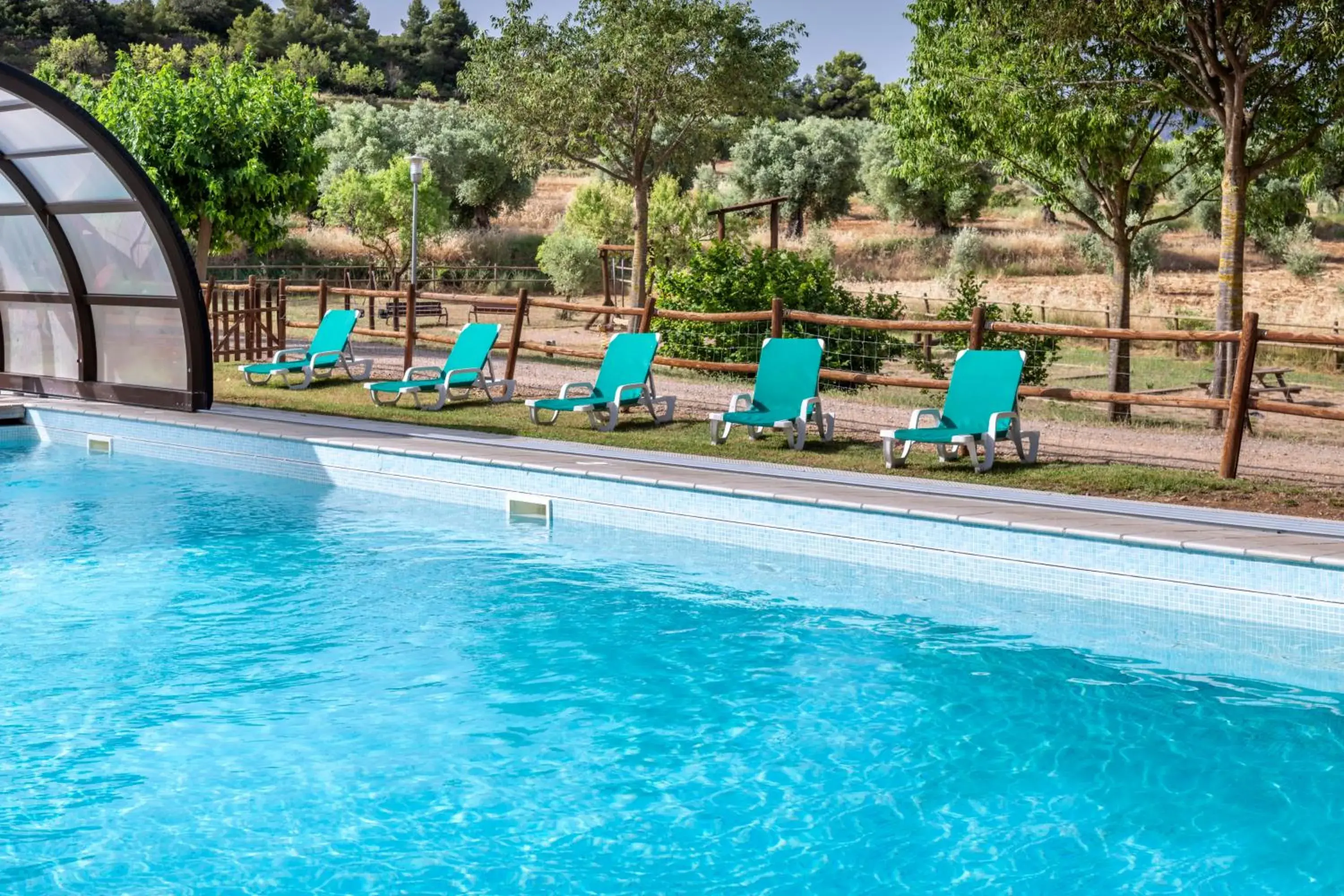 Swimming pool in Hotel & Resort Vilar Rural d'Arnes by Serhs Hotels Swimming pool in Hotel & Resort Vilar Rural d'Arnes by Serhs Hotels