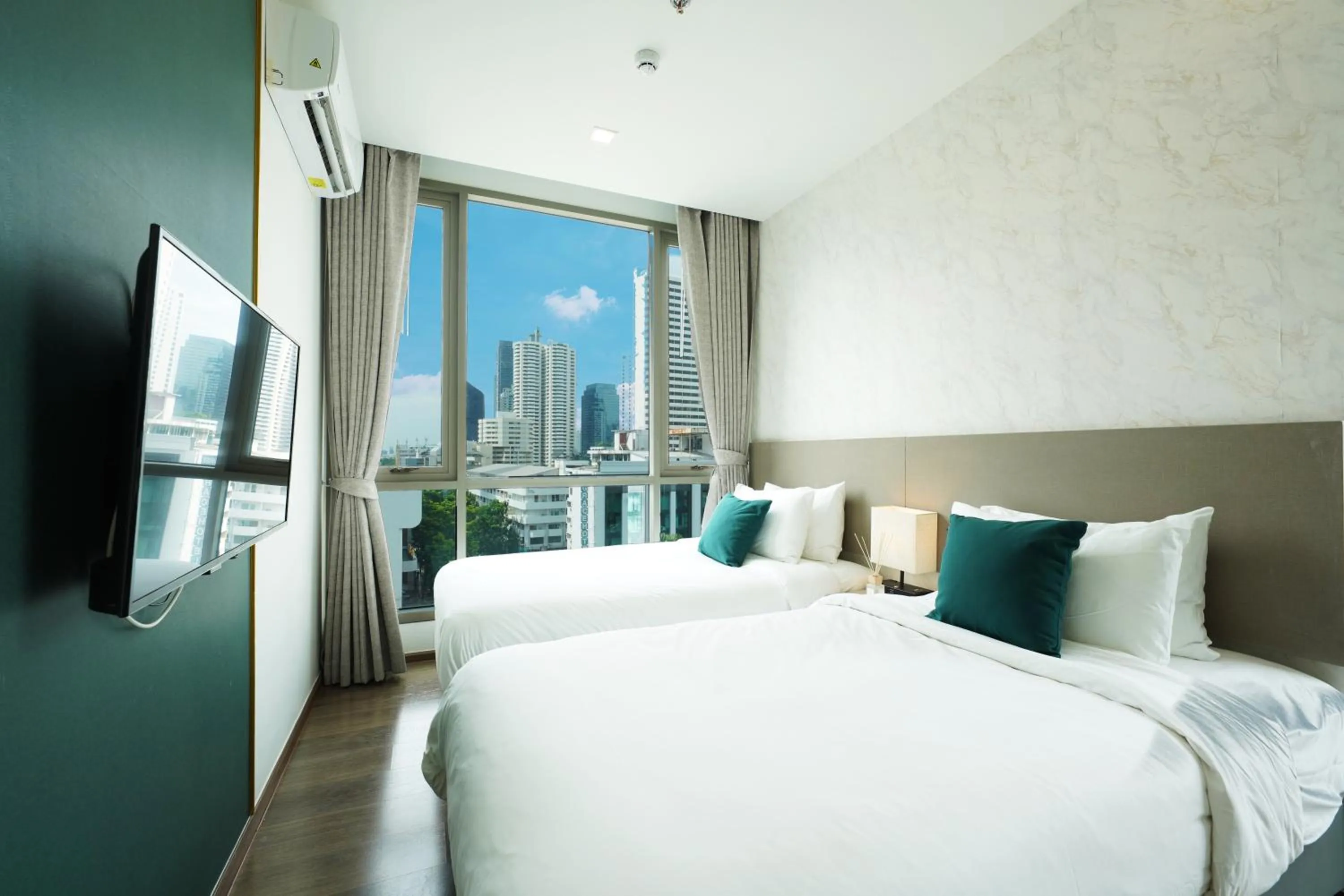 Bedroom, Bed in The Rich Residence Sukhumvit Nana