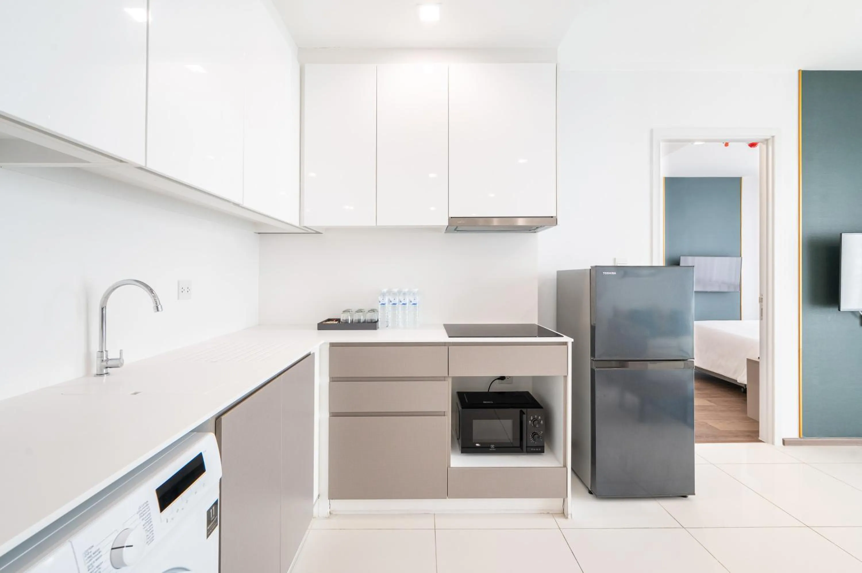 Kitchen or kitchenette in The Rich Residence Sukhumvit Nana