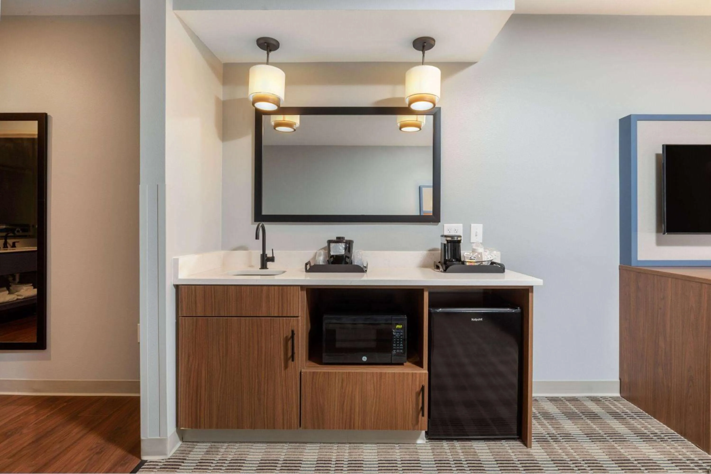 Bed in AmericInn by Wyndham Mountain Home