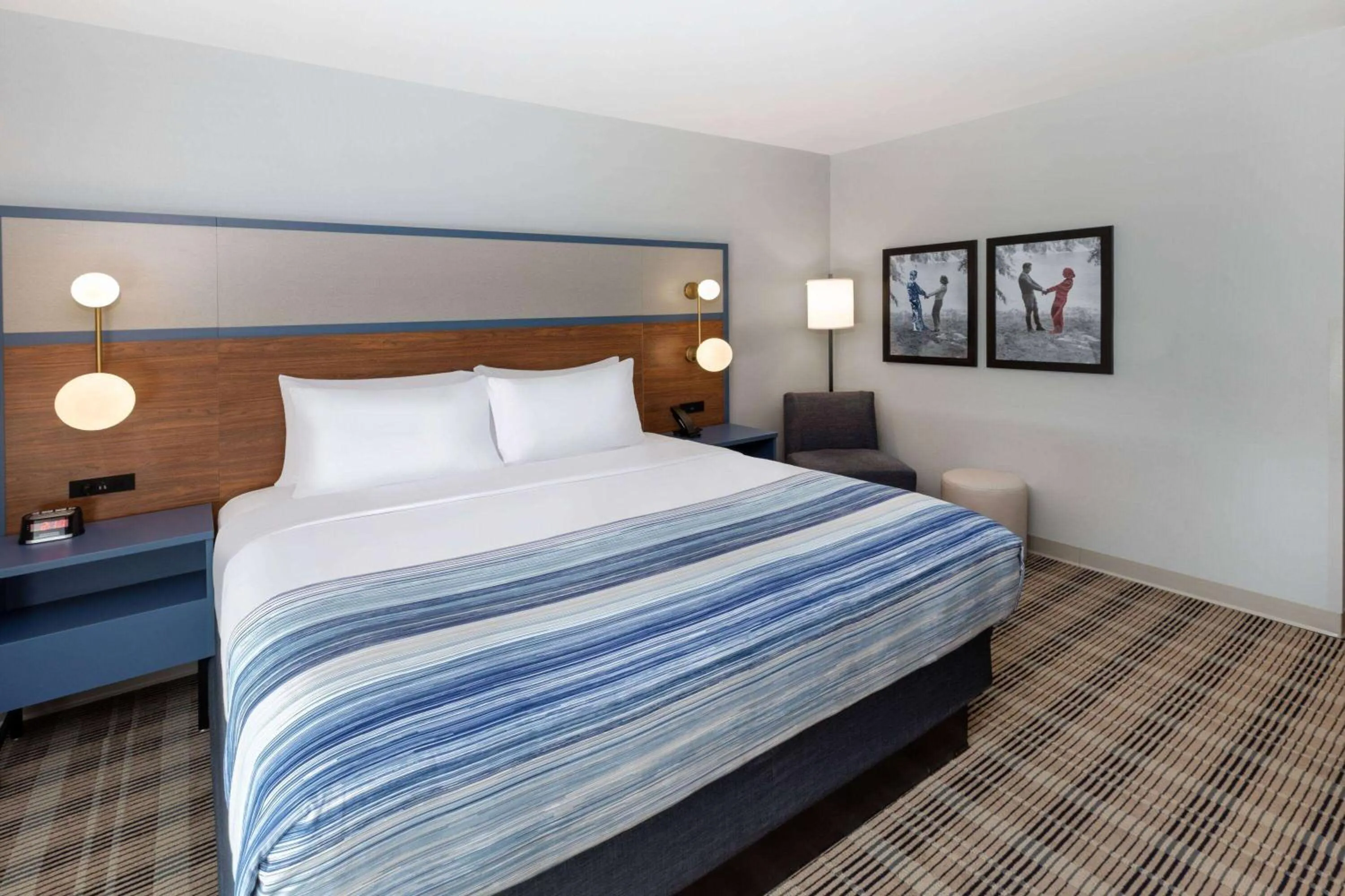 Bed in AmericInn by Wyndham Mountain Home