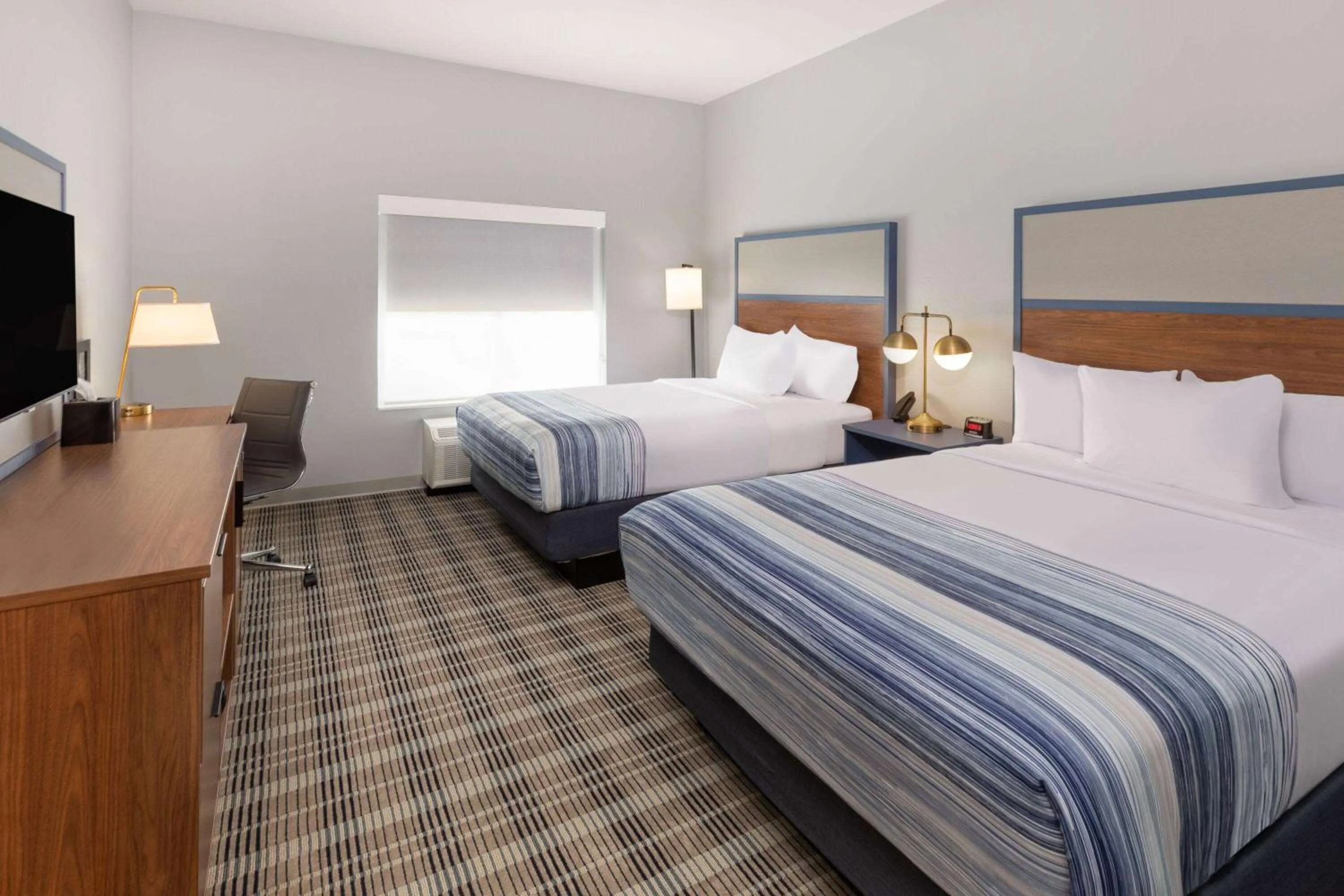 Photo of the whole room, Bed in AmericInn by Wyndham Mountain Home