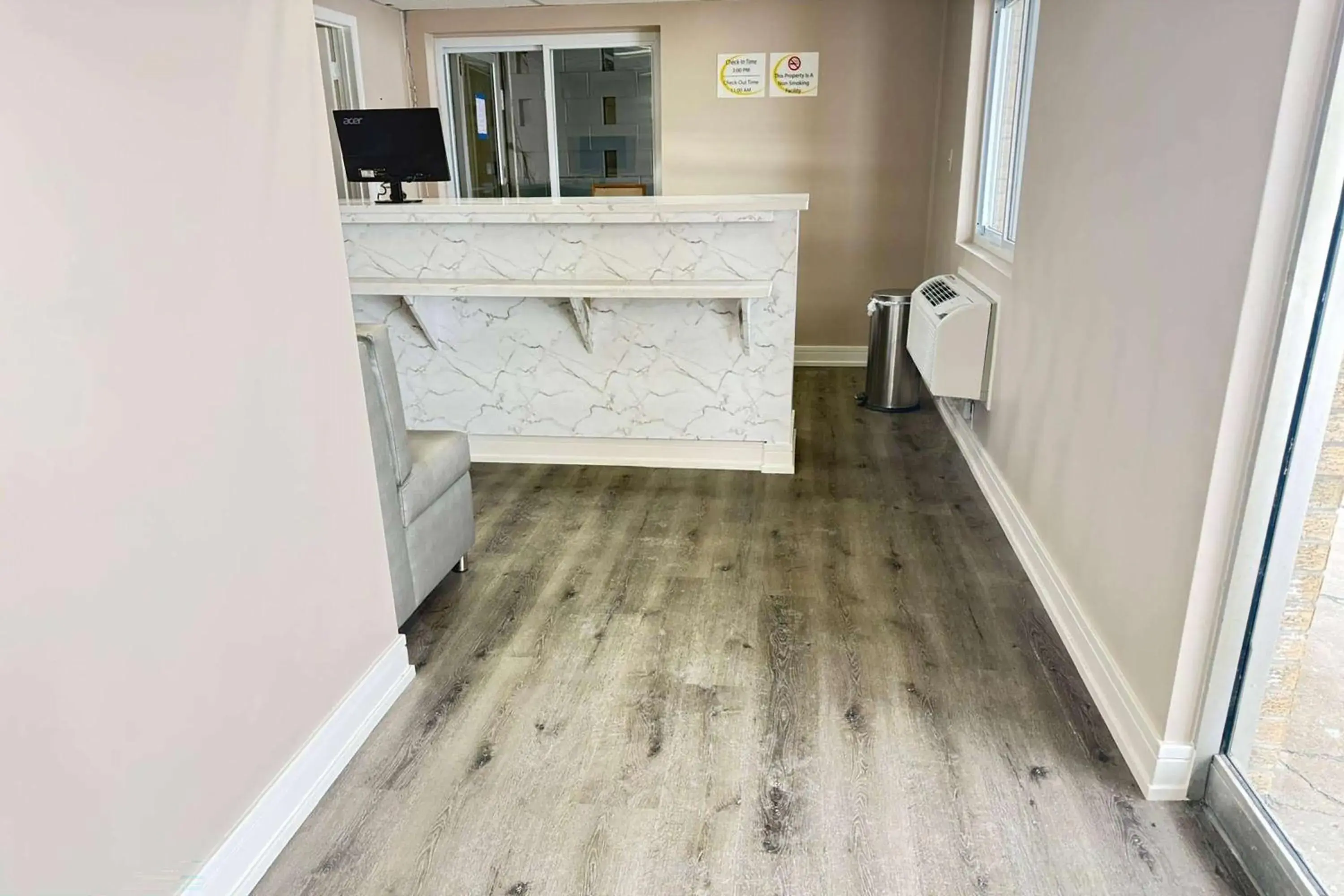 Lobby or reception in Super 8 by Wyndham Rockford South Lobby or reception in Super 8 by Wyndham Rockford South