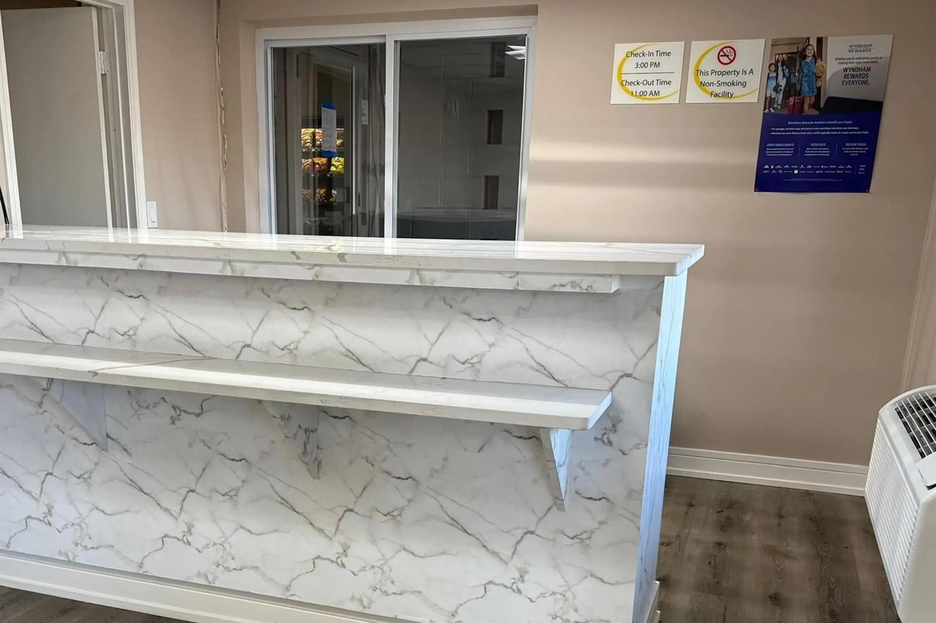 Lobby or reception in Super 8 by Wyndham Rockford South Lobby or reception in Super 8 by Wyndham Rockford South