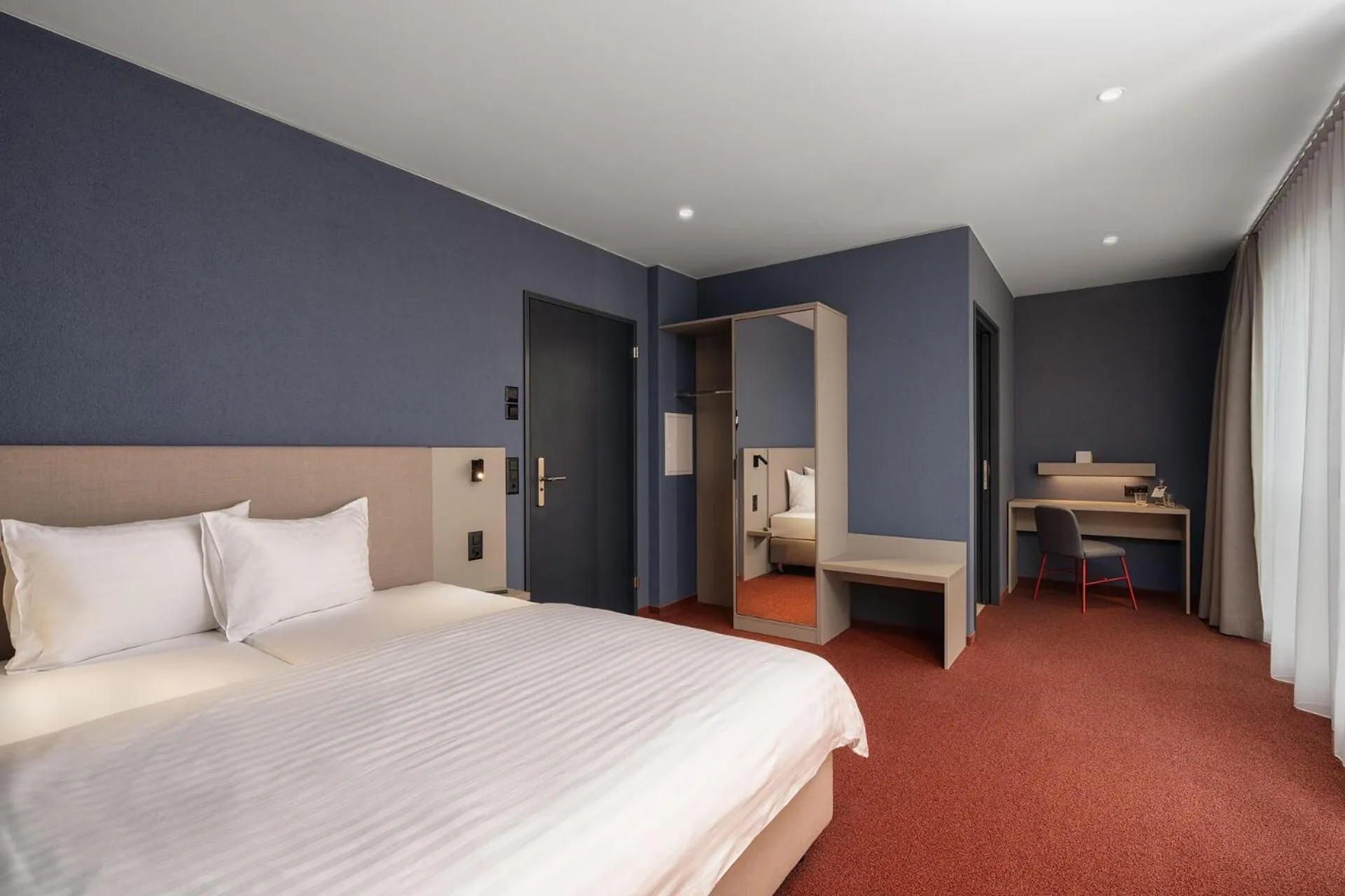 Bed in b-smart hotel Arbon