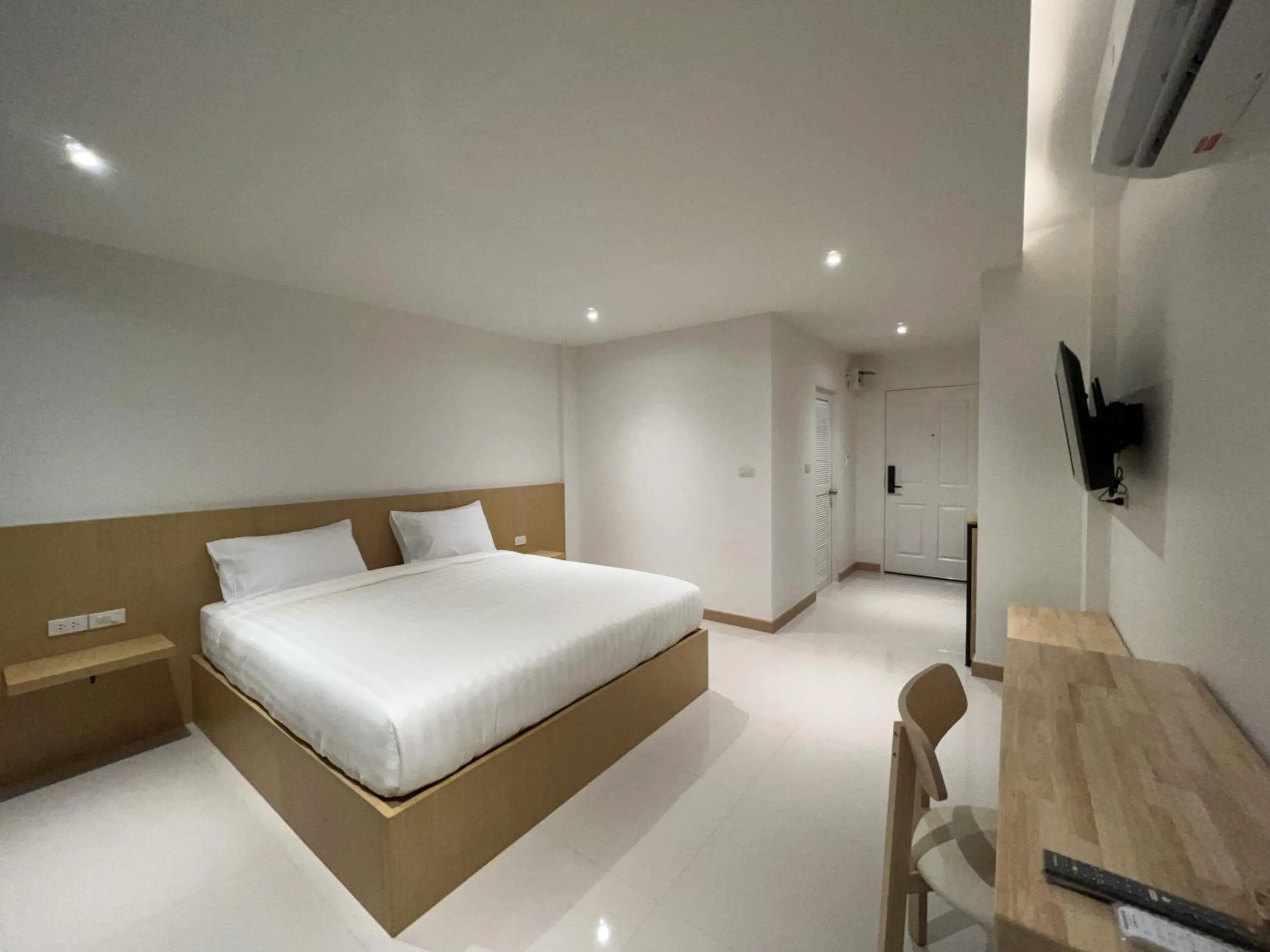 Bed in Super Highway Hotel