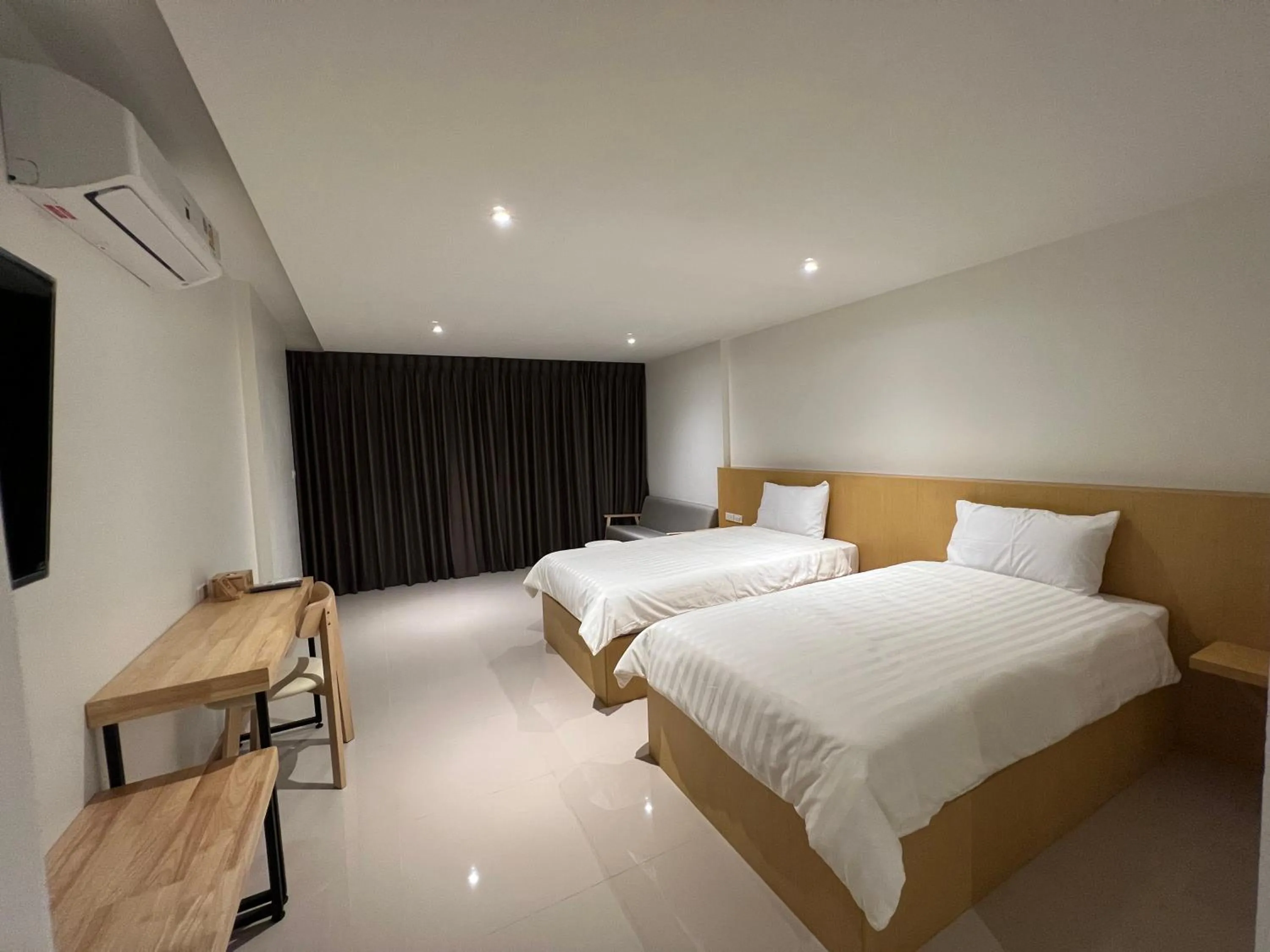 Bed in Super Highway Hotel