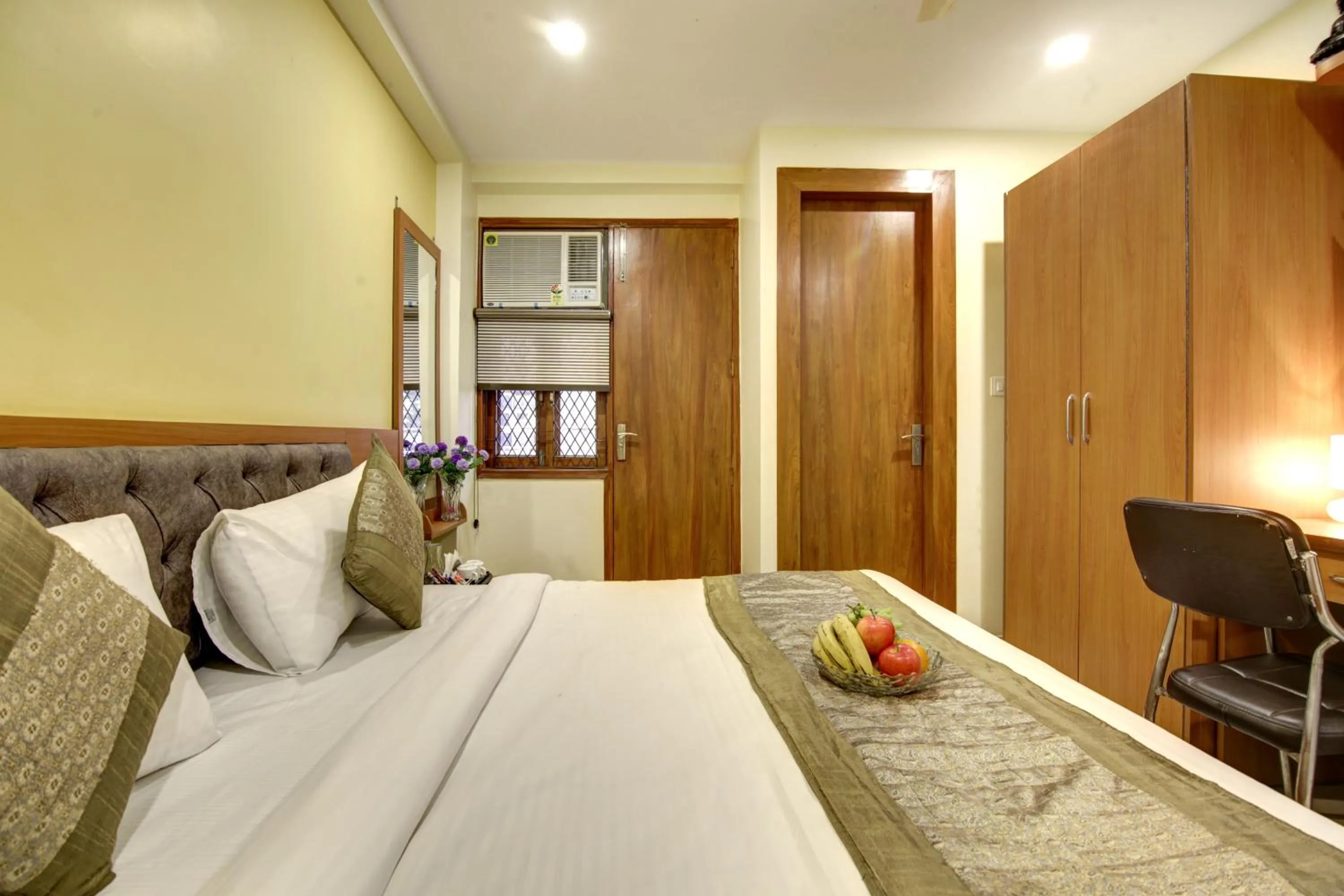 Bed in Hotel TMS Grand