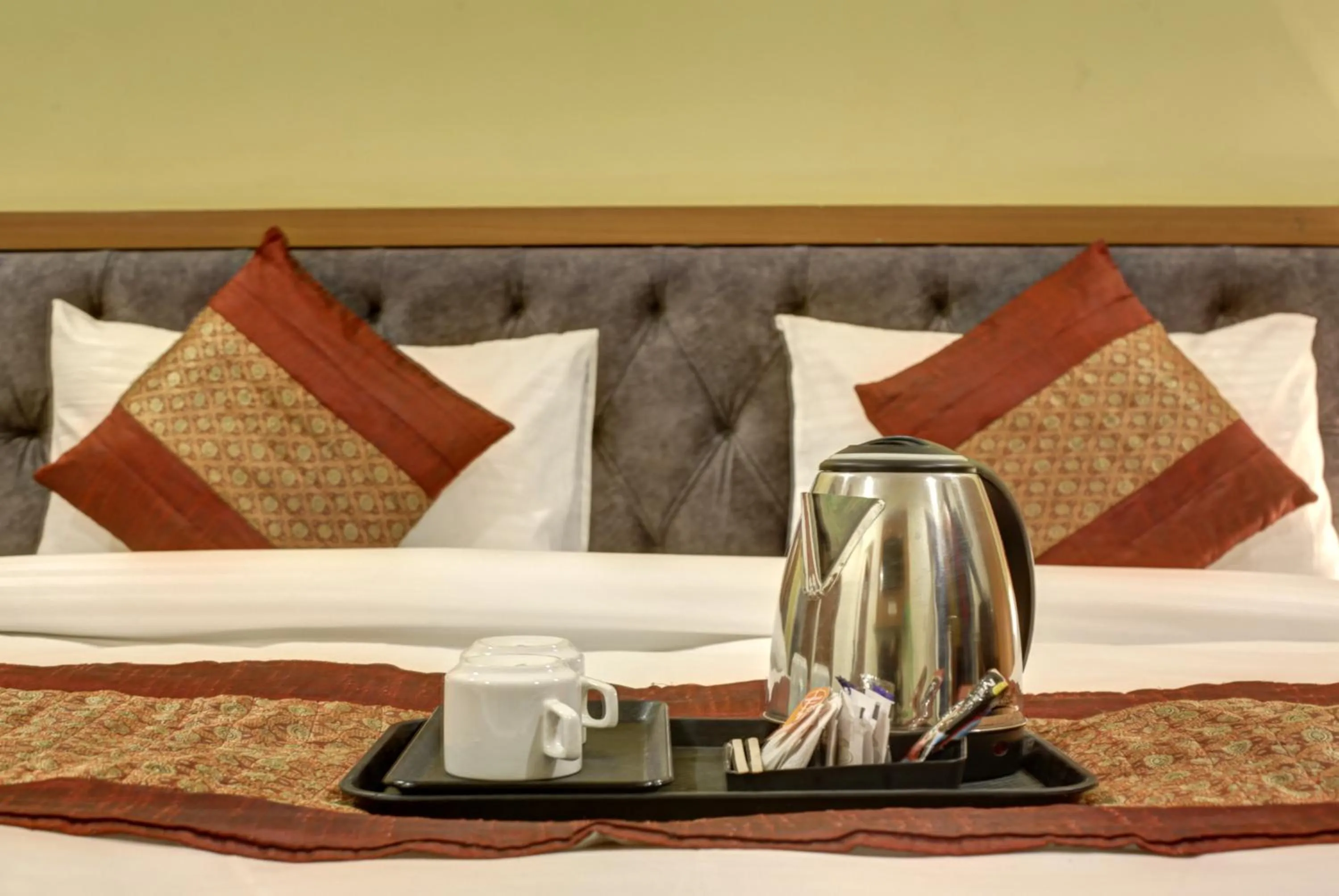 Bed in Hotel TMS Grand