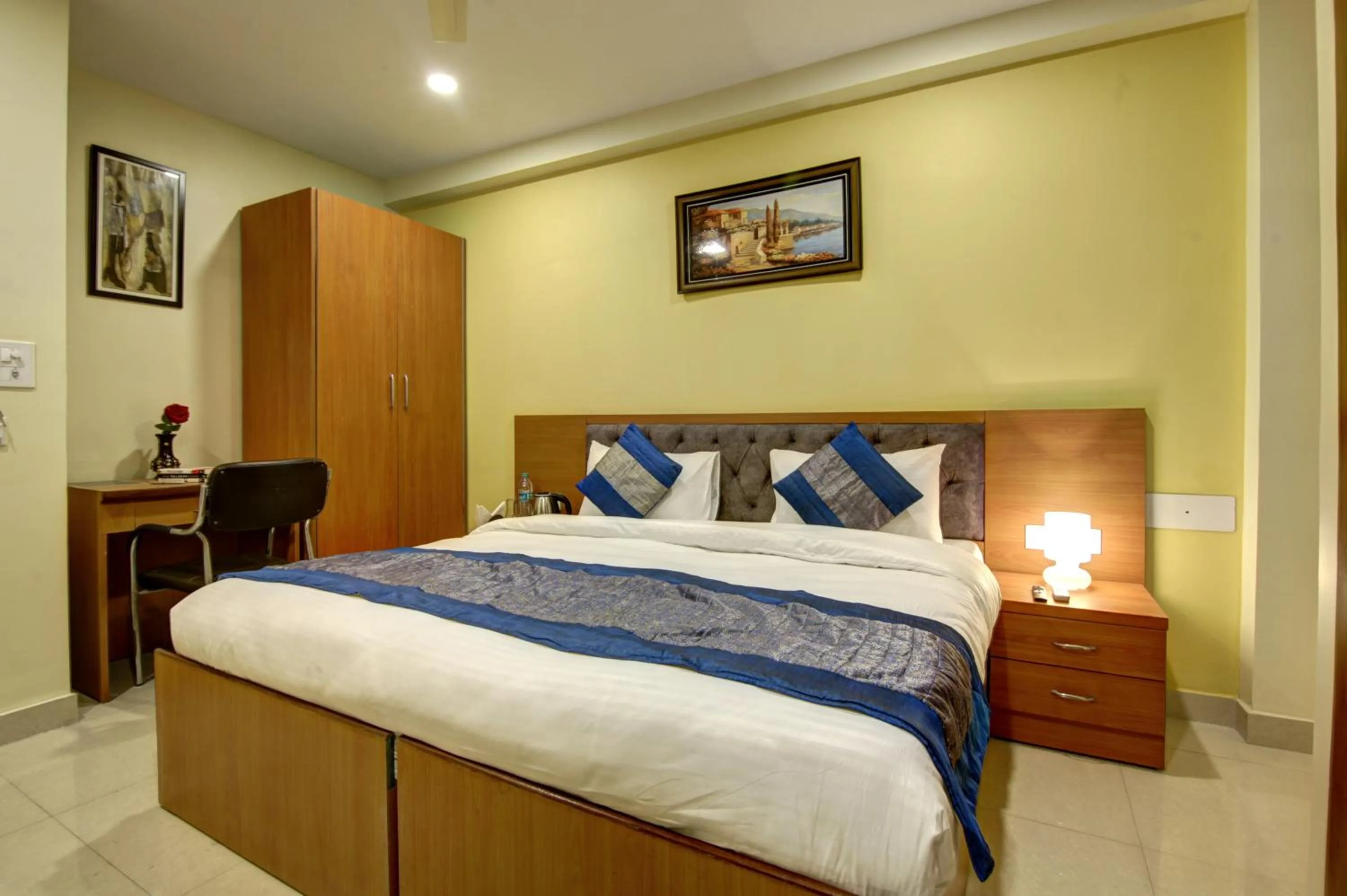 Bed in Hotel TMS Grand