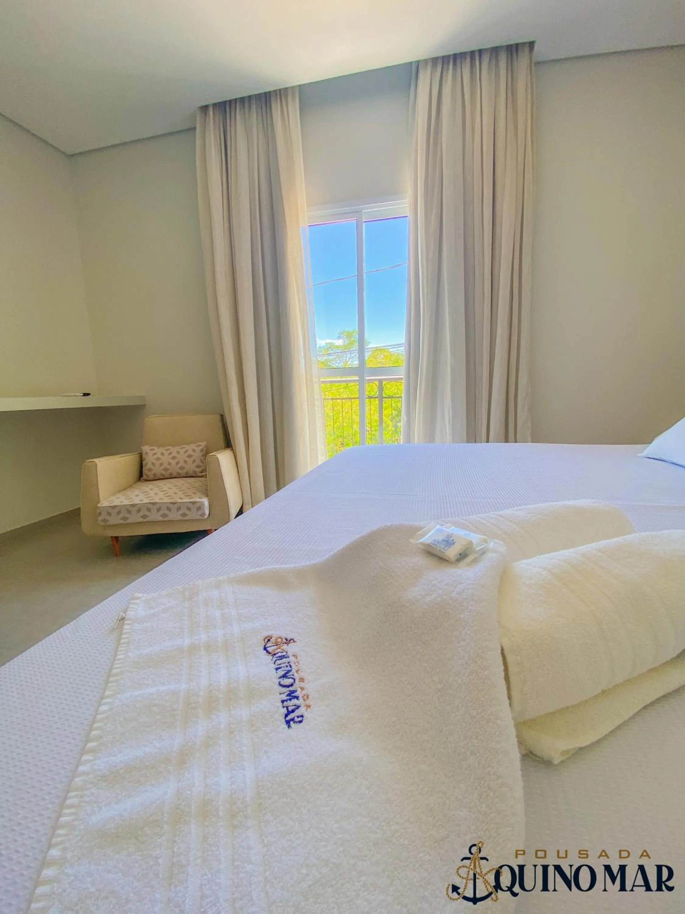 Photo of the whole room, Bed in Pousada Aquino Mar