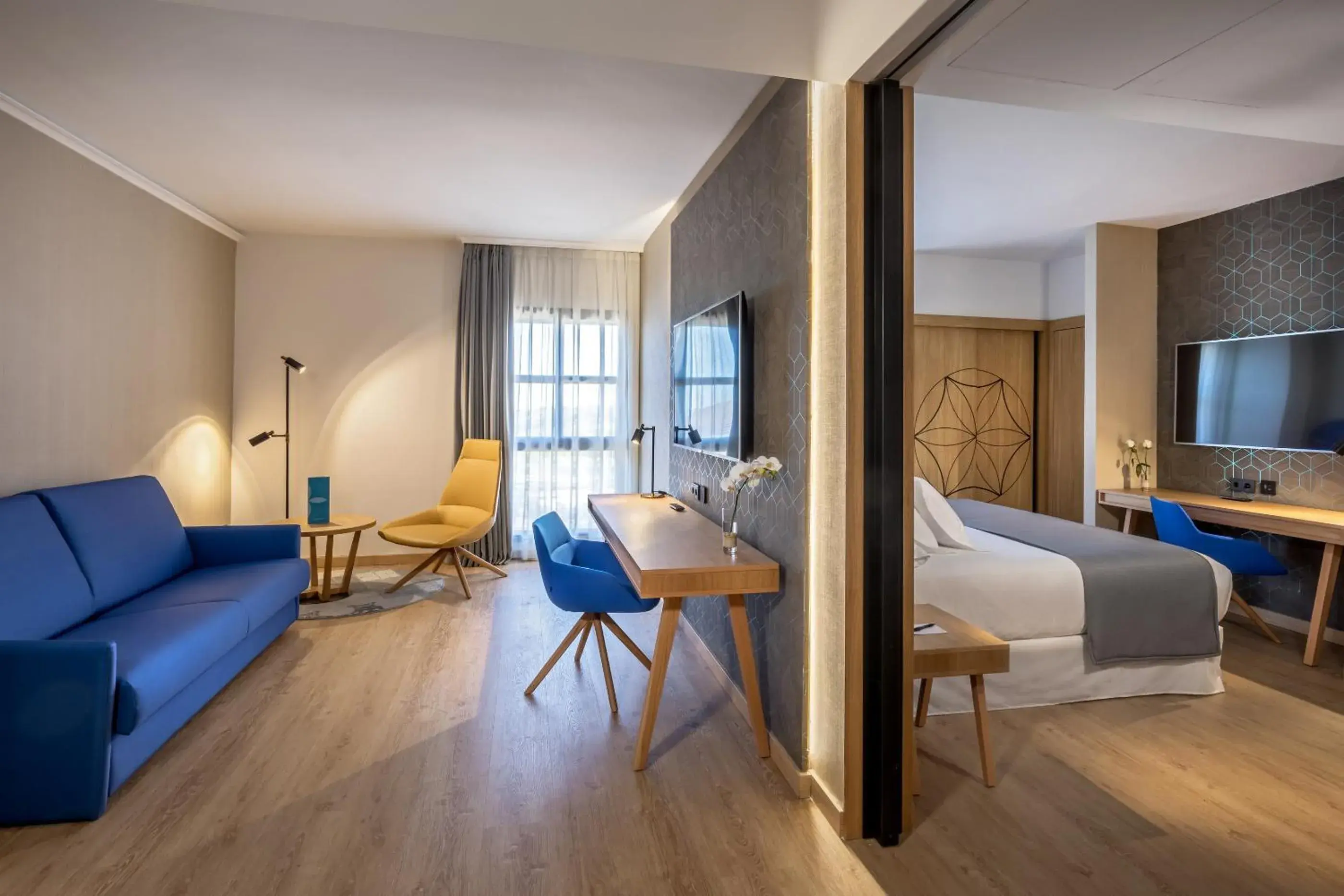 Living room, Bed in Barceló Cáceres V Centenario Living room, Bed in Barceló Cáceres V Centenario