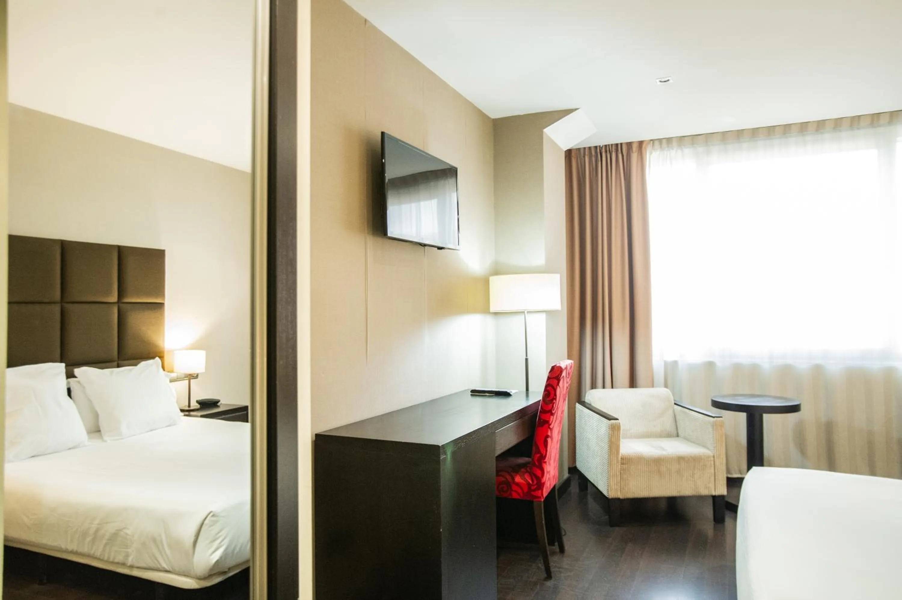 Bed in AZZ Asturias LangreHotel & Spa