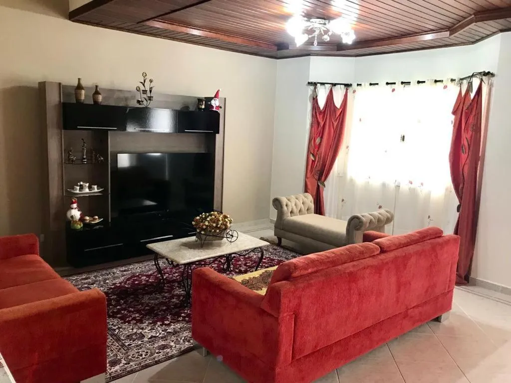 Communal lounge/ TV room in POUSADA RECANTO SÃO JORGE