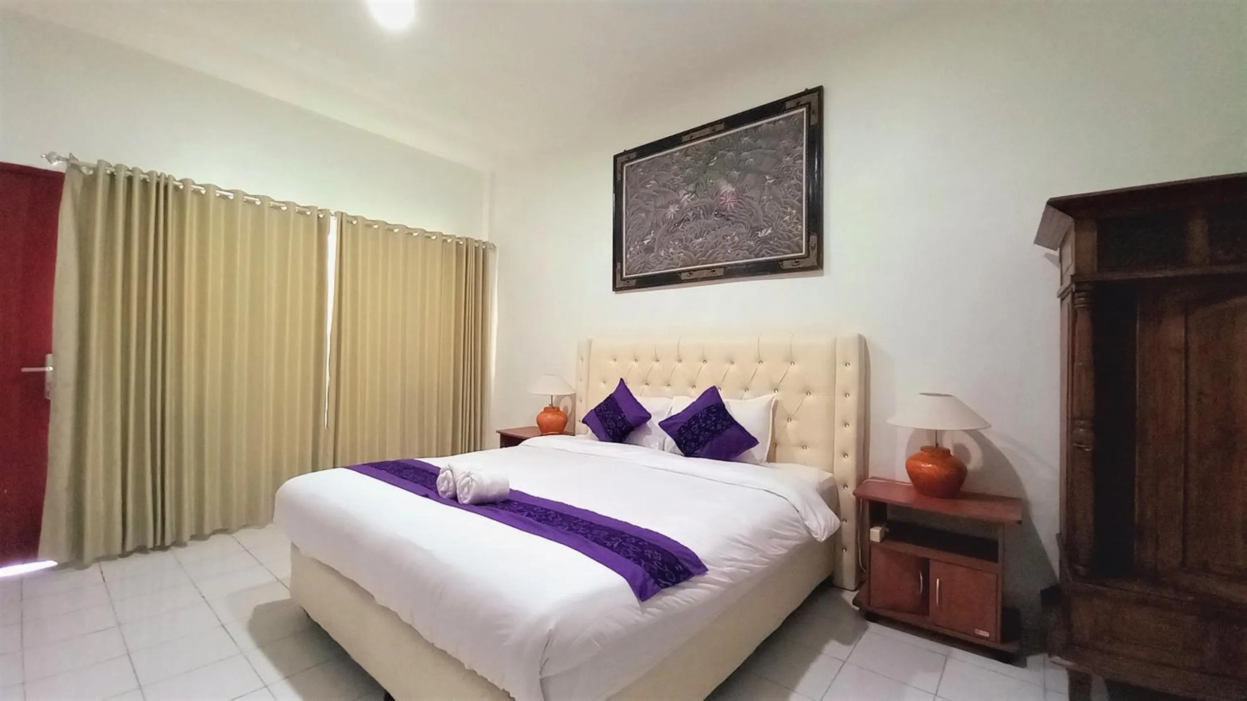 Bed in Matahari Inn Kuta Lombok