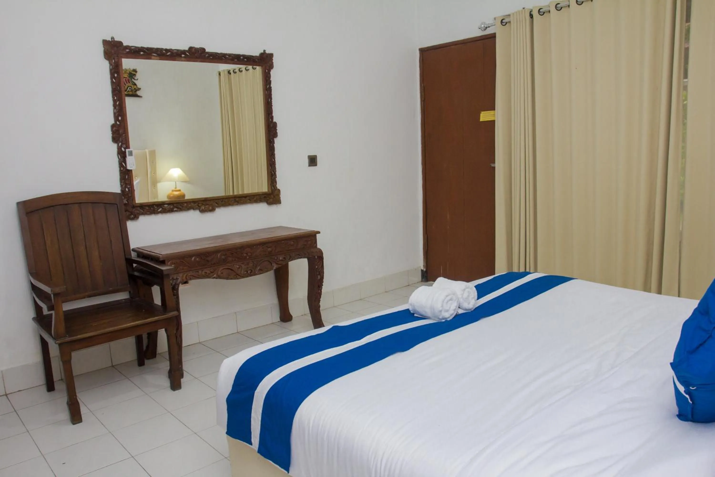 Bed in Matahari Inn Kuta Lombok