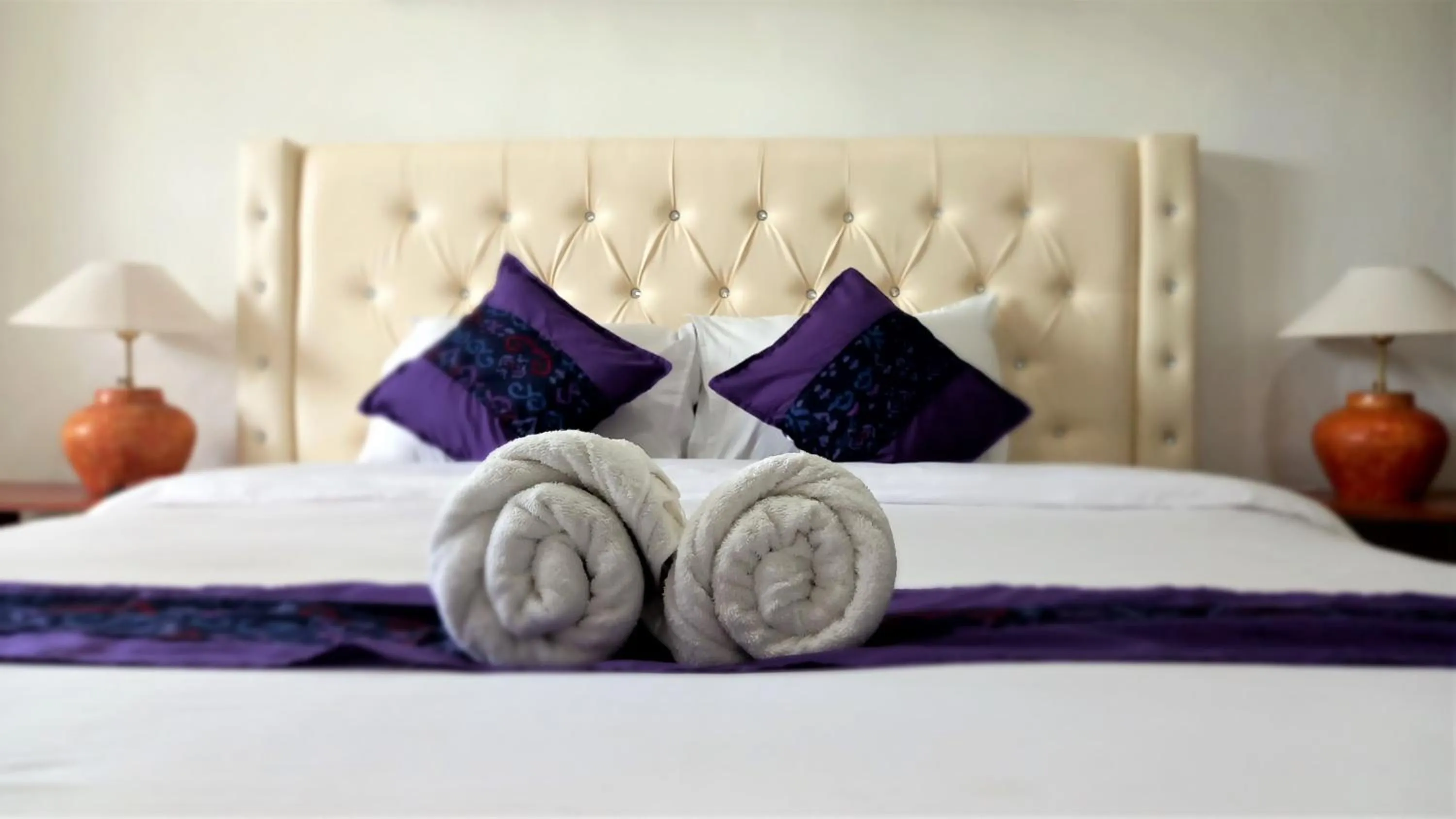 Bed in Matahari Inn Kuta Lombok