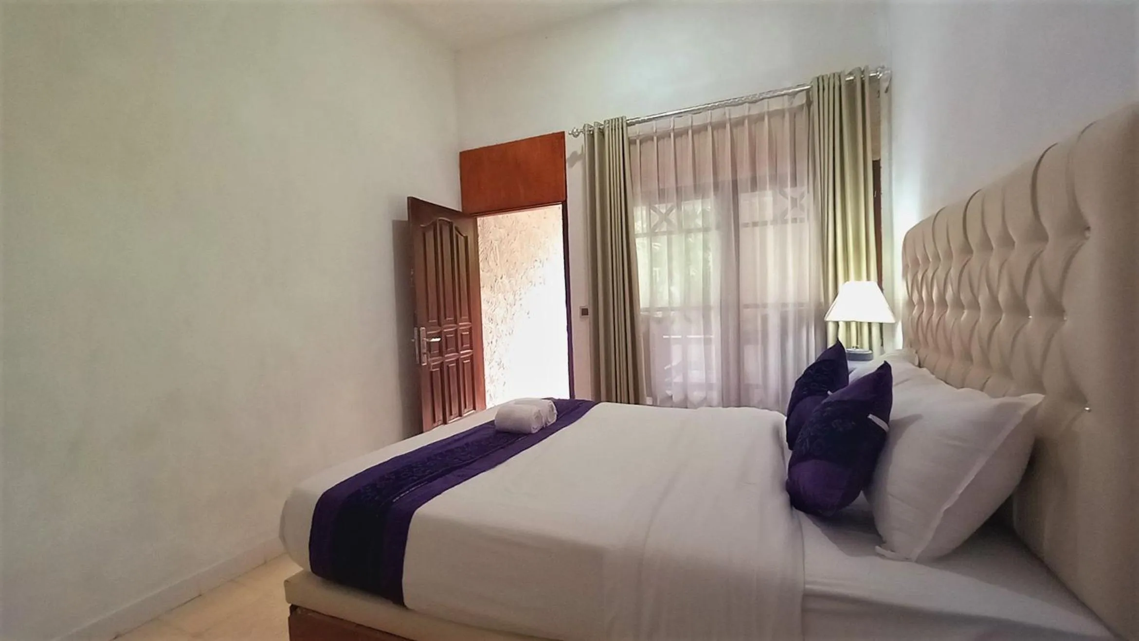 Bed in Matahari Inn Kuta Lombok