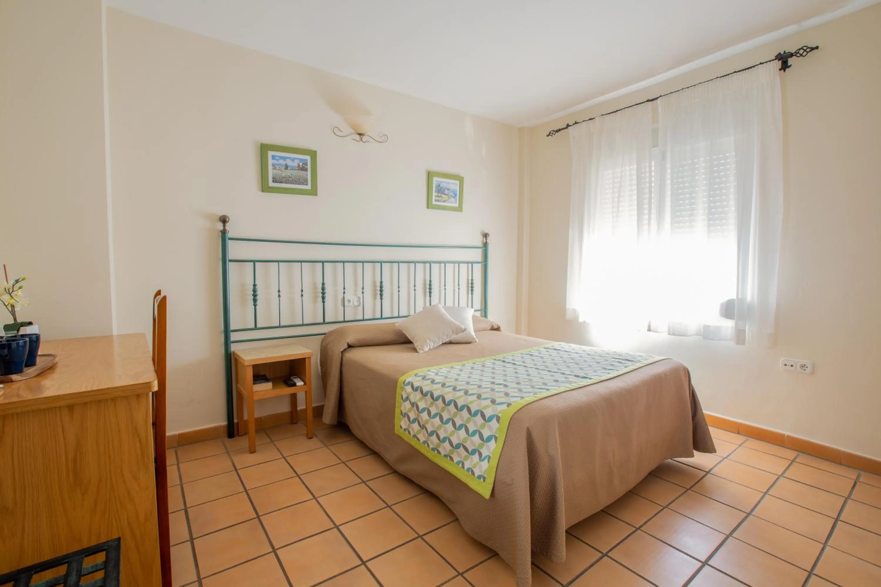 Bed in Hostal El Gallo