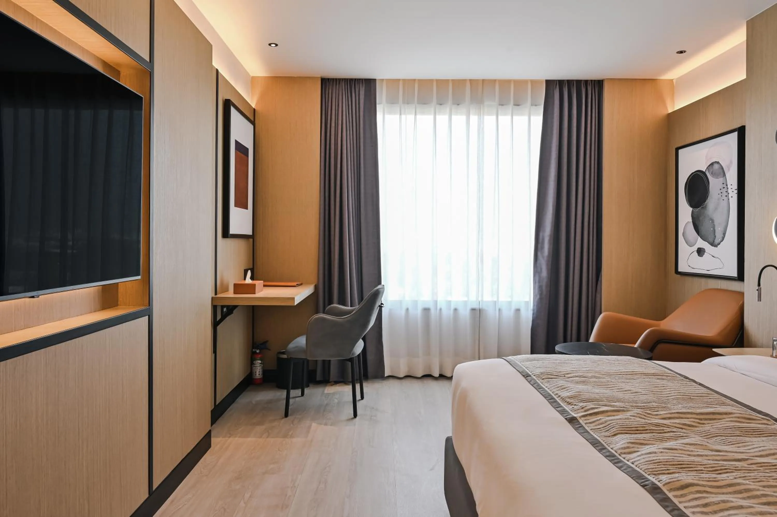 Bed in Parallel Hotel Udaipur, a member of Radisson Individuals