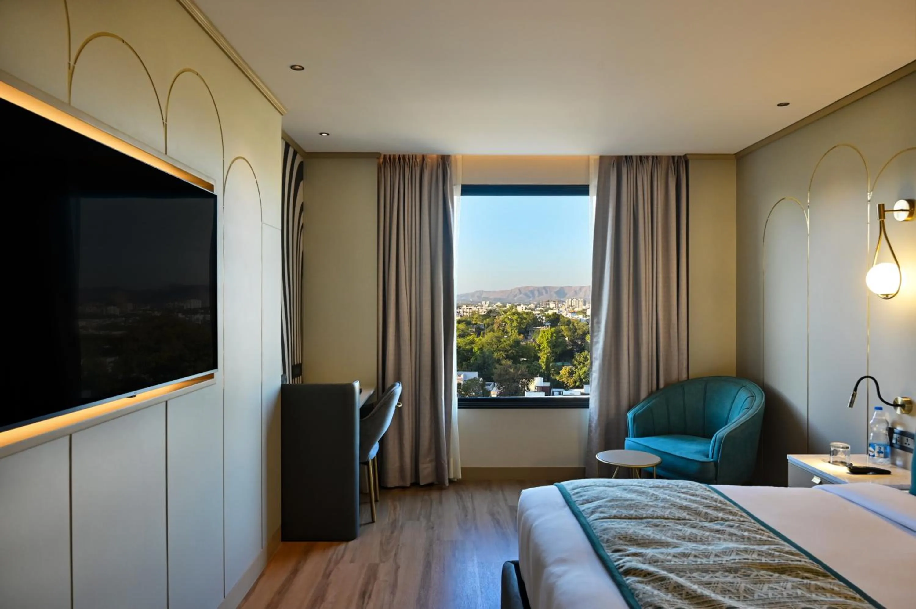 Bed in Parallel Hotel Udaipur, a member of Radisson Individuals