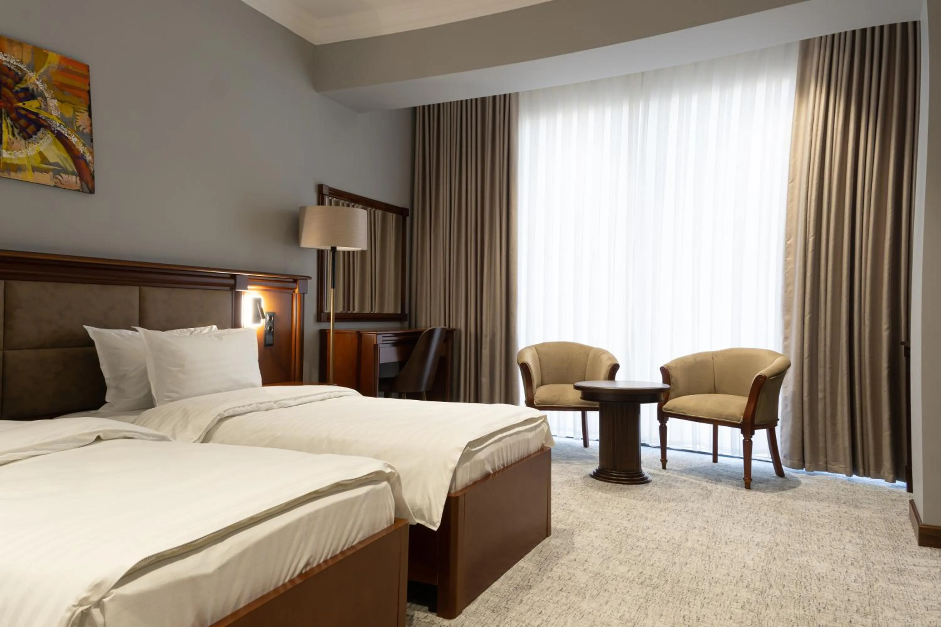 Bed in Mir Luxe Plaza