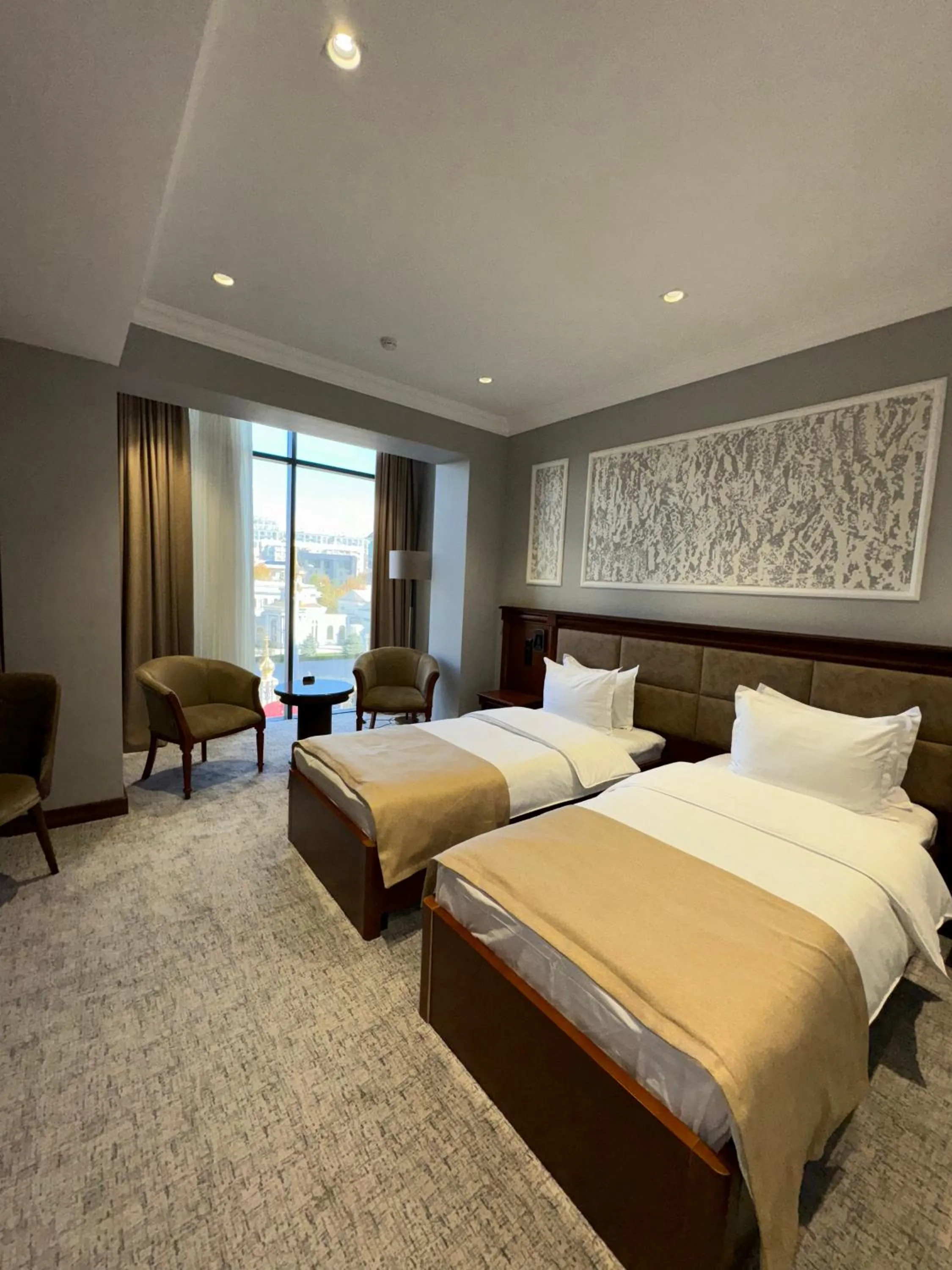 Bed in Mir Luxe Plaza