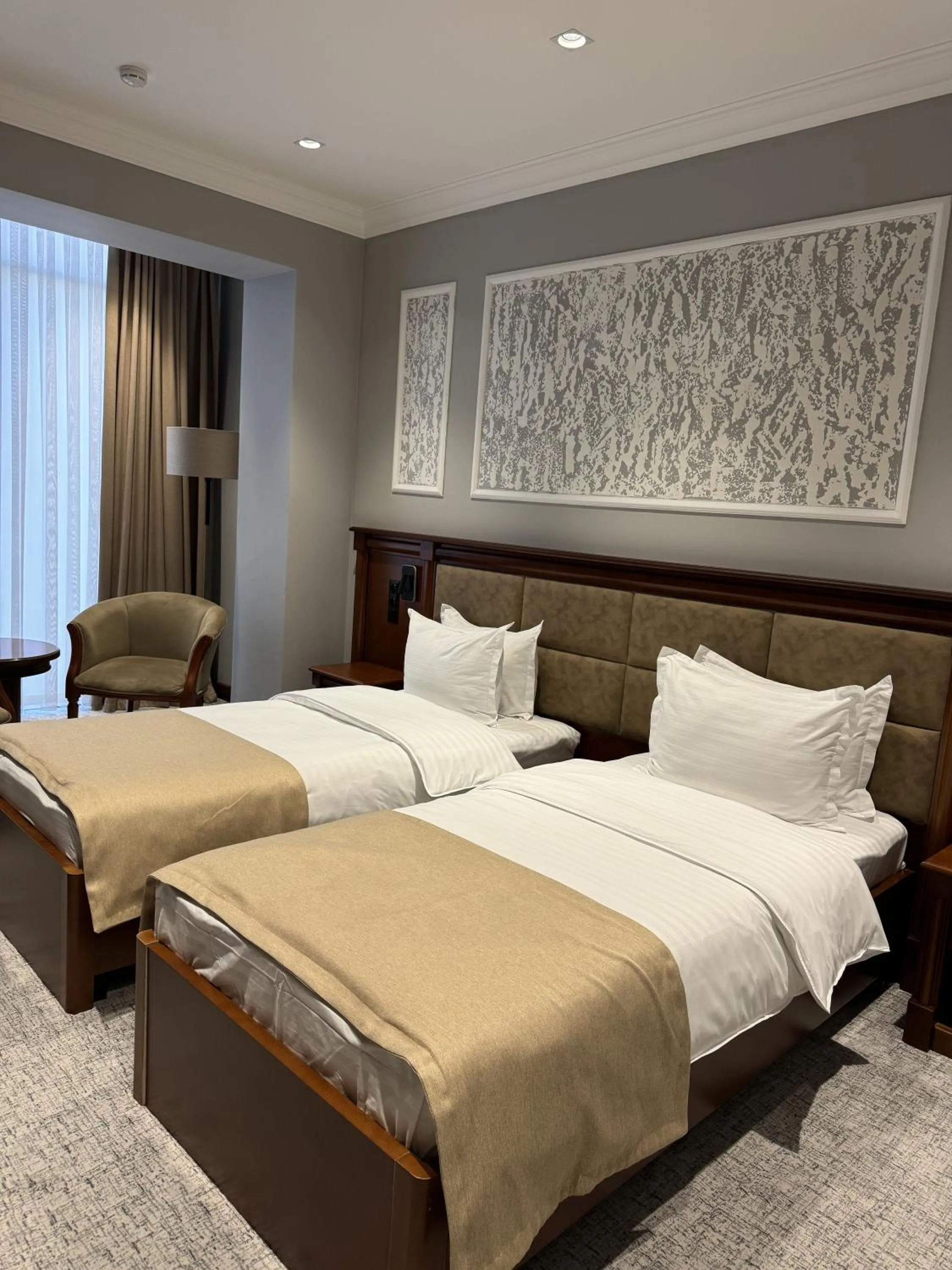 Bed in Mir Luxe Plaza