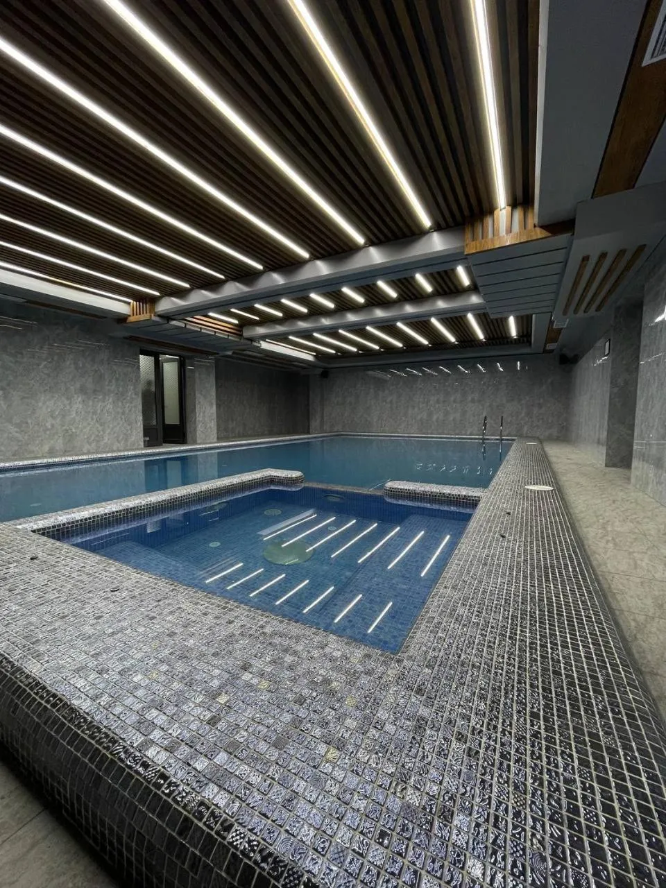 Swimming pool in Mir Luxe Plaza