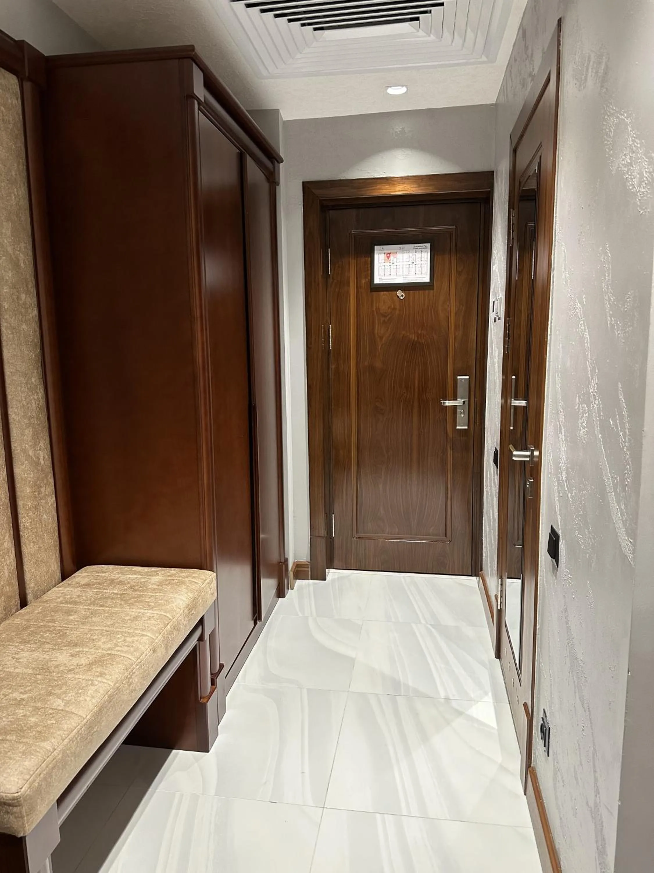 Seating area, Bed in Mir Luxe Plaza