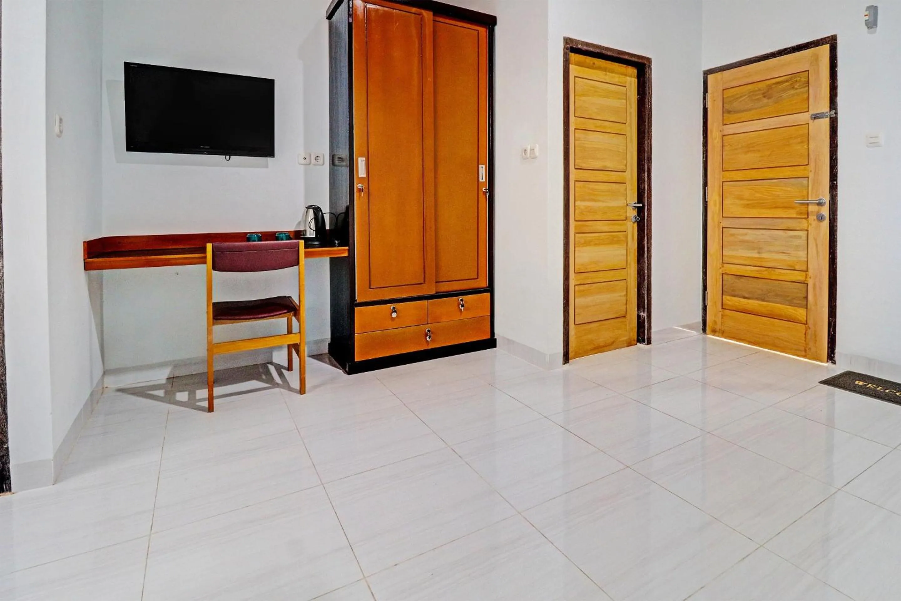 Bedroom in OYO 92057 Reny Kost Syariah