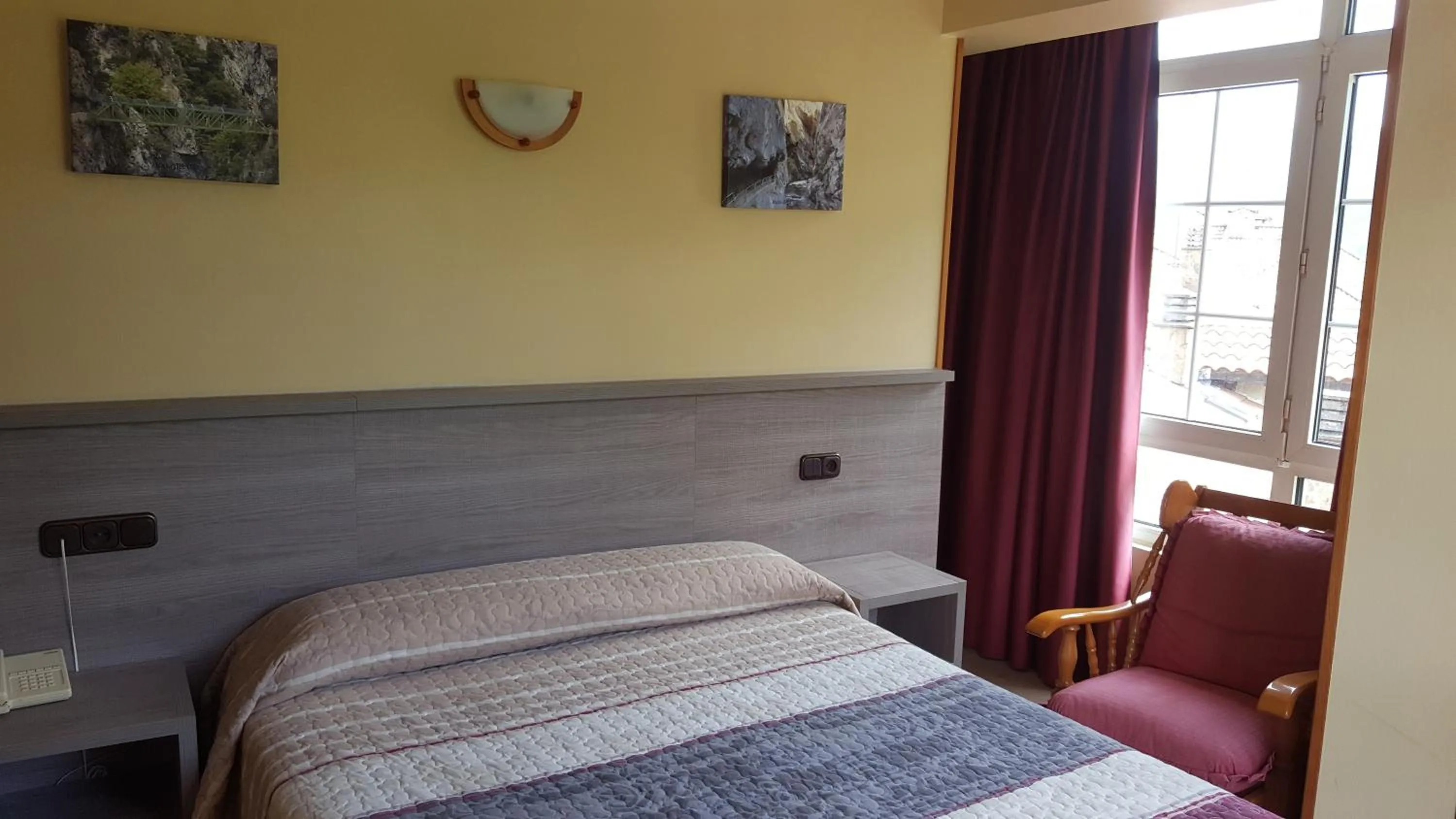 Decorative detail, Bed in Hotel Naranjo De Bulnes