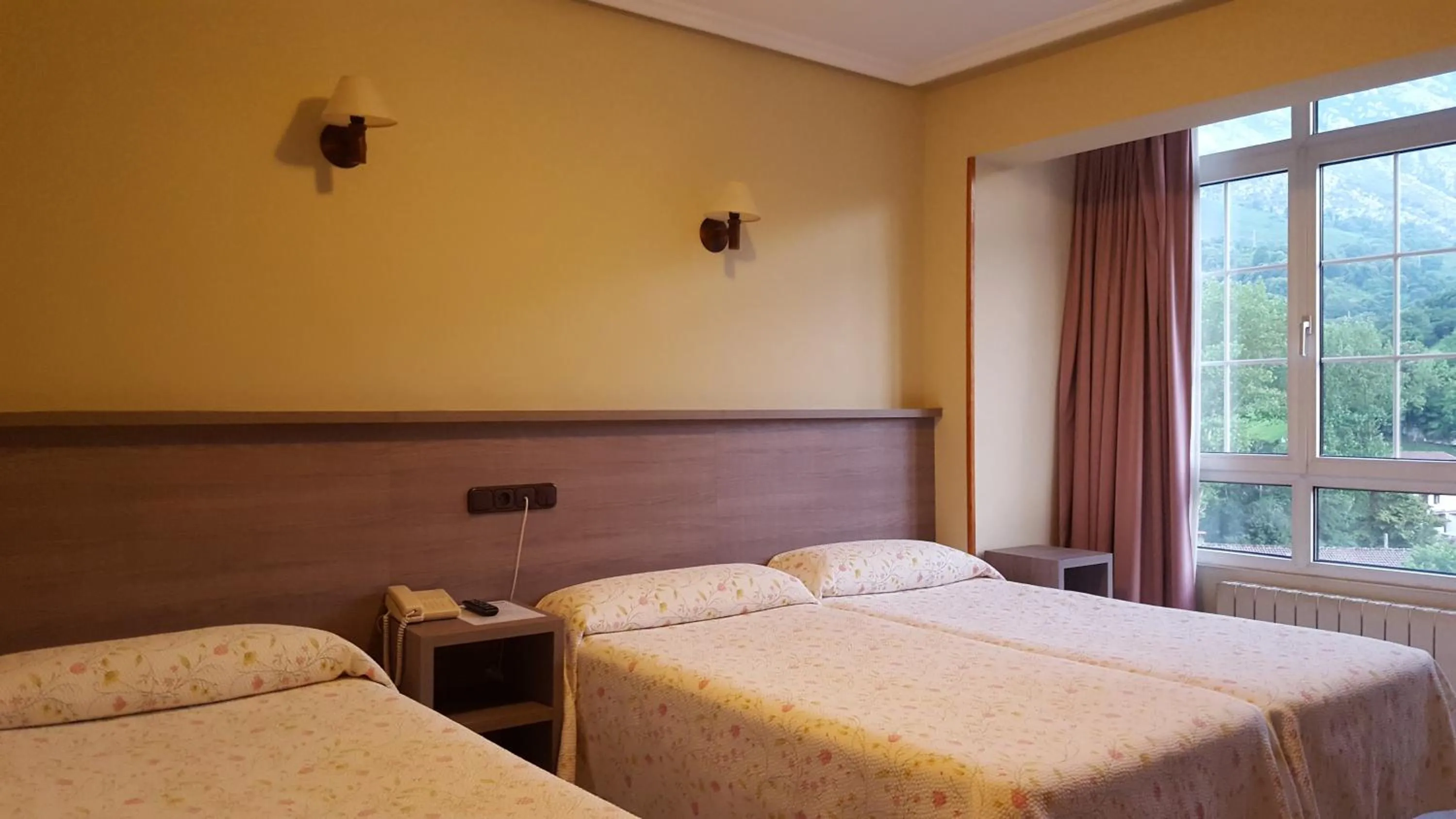 Bed in Hotel Naranjo De Bulnes