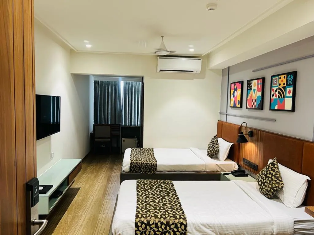 Bed in The Lemon Grass Hotel