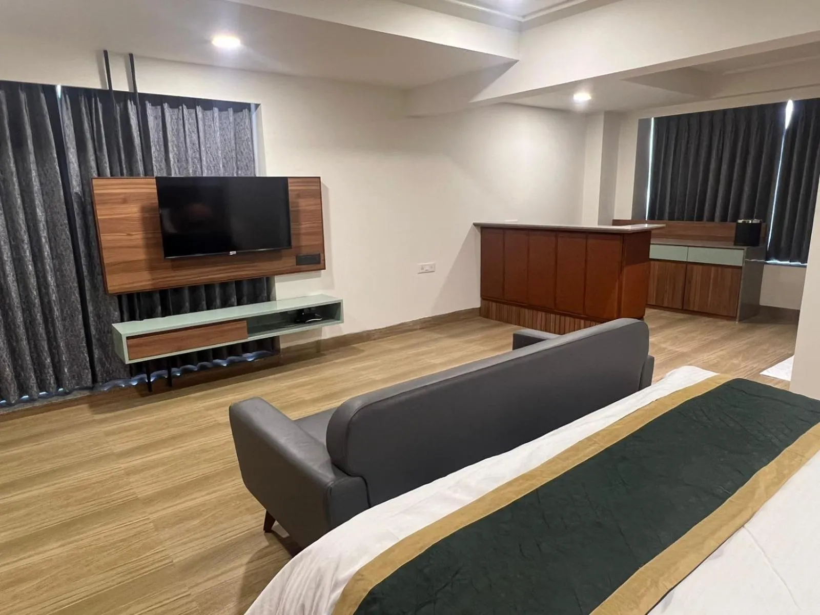 Communal lounge/ TV room in The Lemon Grass Hotel