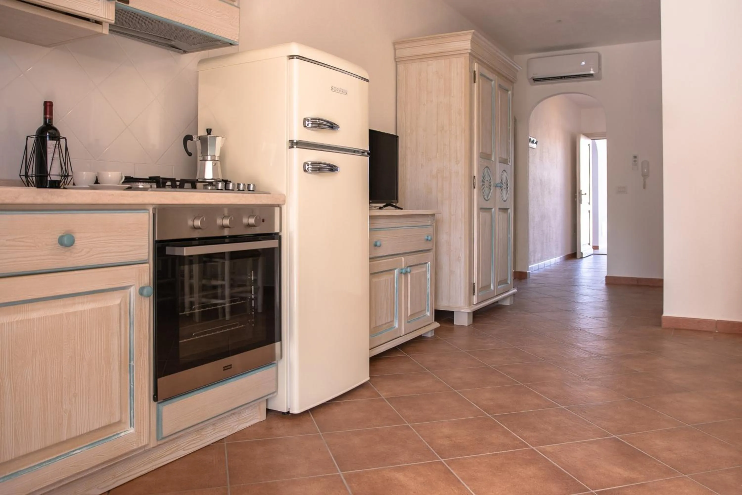 Kitchen or kitchenette in Le Residenze Del Golfo Di Orosei Bilo 5 - Happy Rentals
