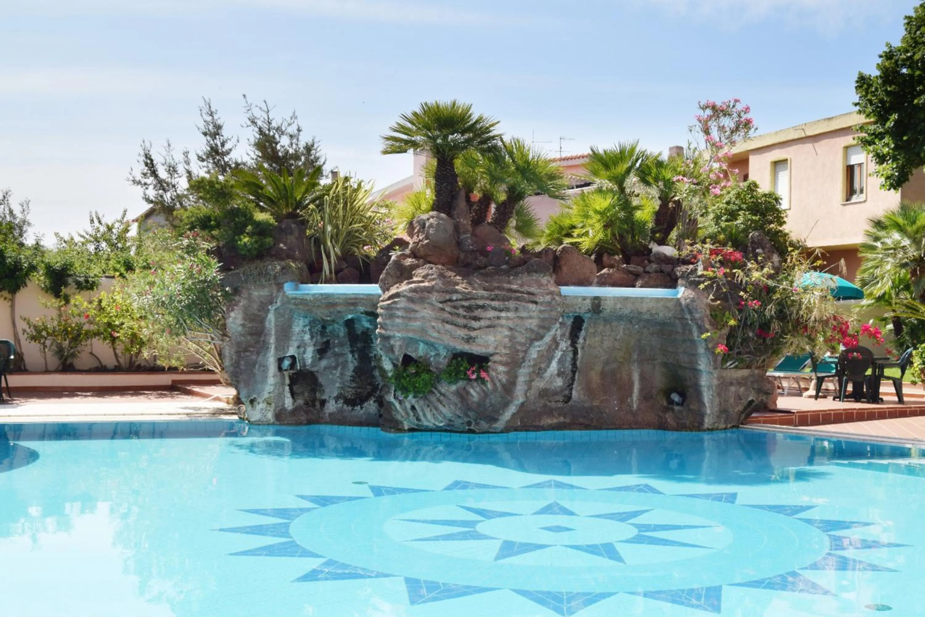 Swimming pool in Le Residenze Del Golfo Di Orosei Bilo 5 - Happy Rentals