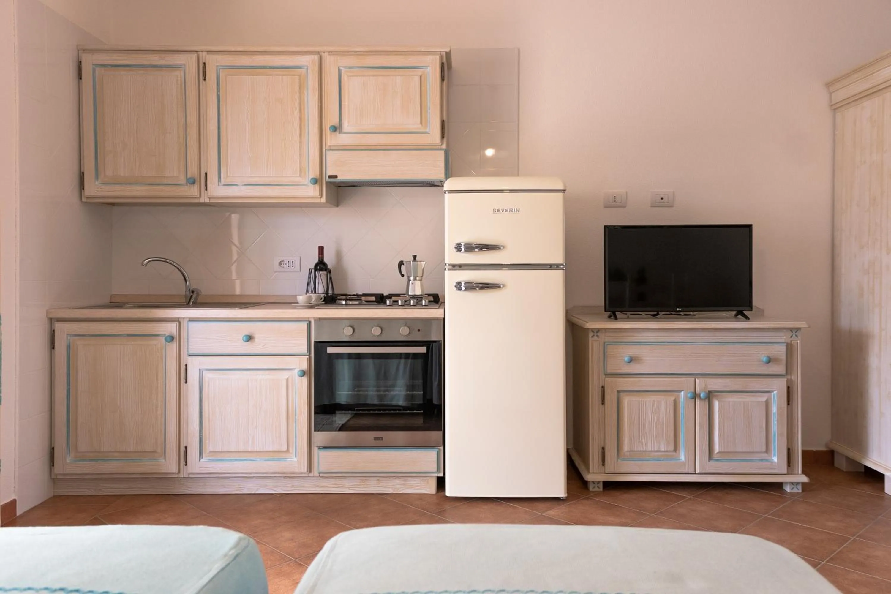 Kitchen or kitchenette in Le Residenze Del Golfo Di Orosei Bilo 5 - Happy Rentals