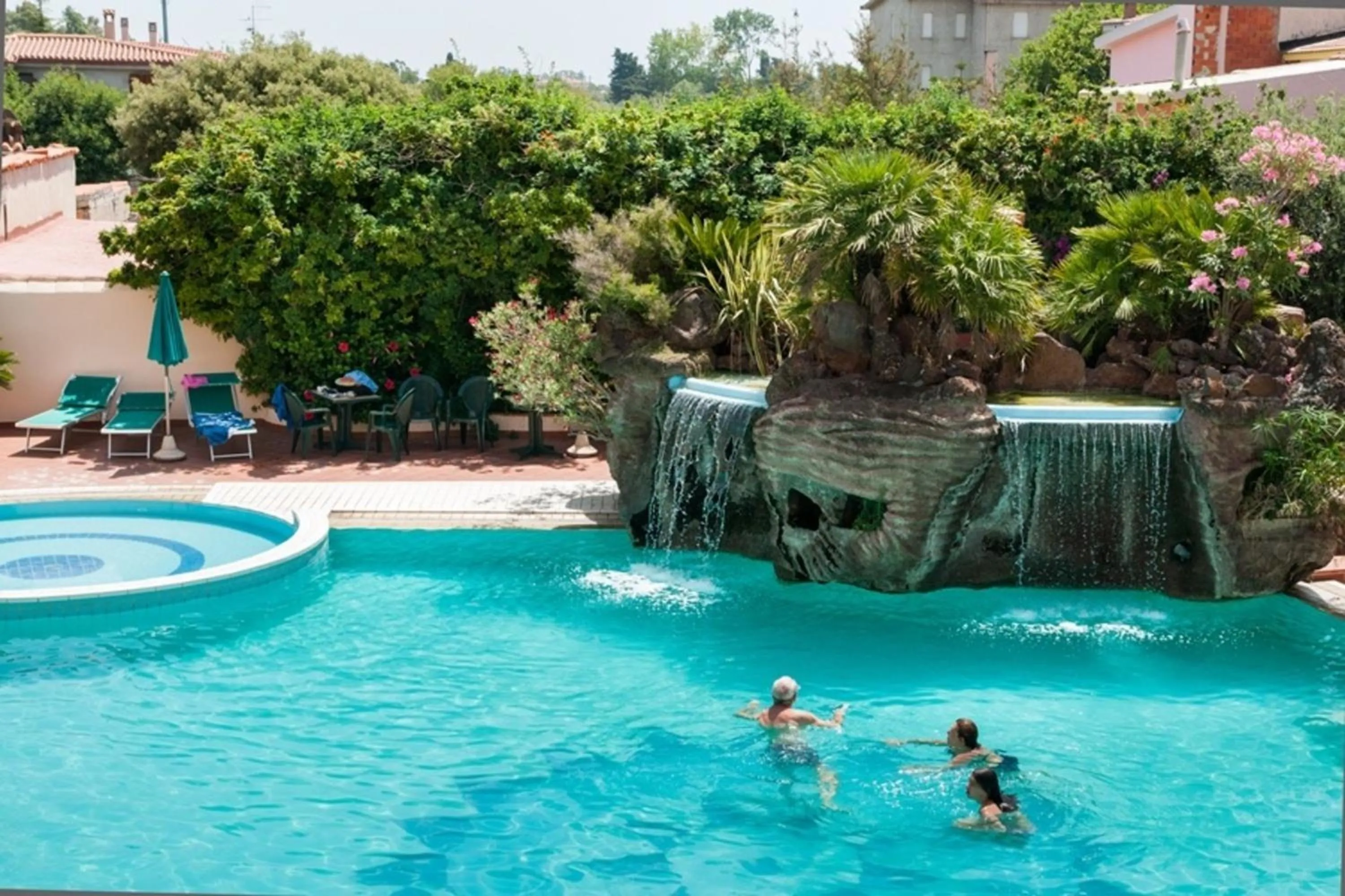 Swimming pool in Le Residenze Del Golfo Di Orosei Bilo 5 - Happy Rentals