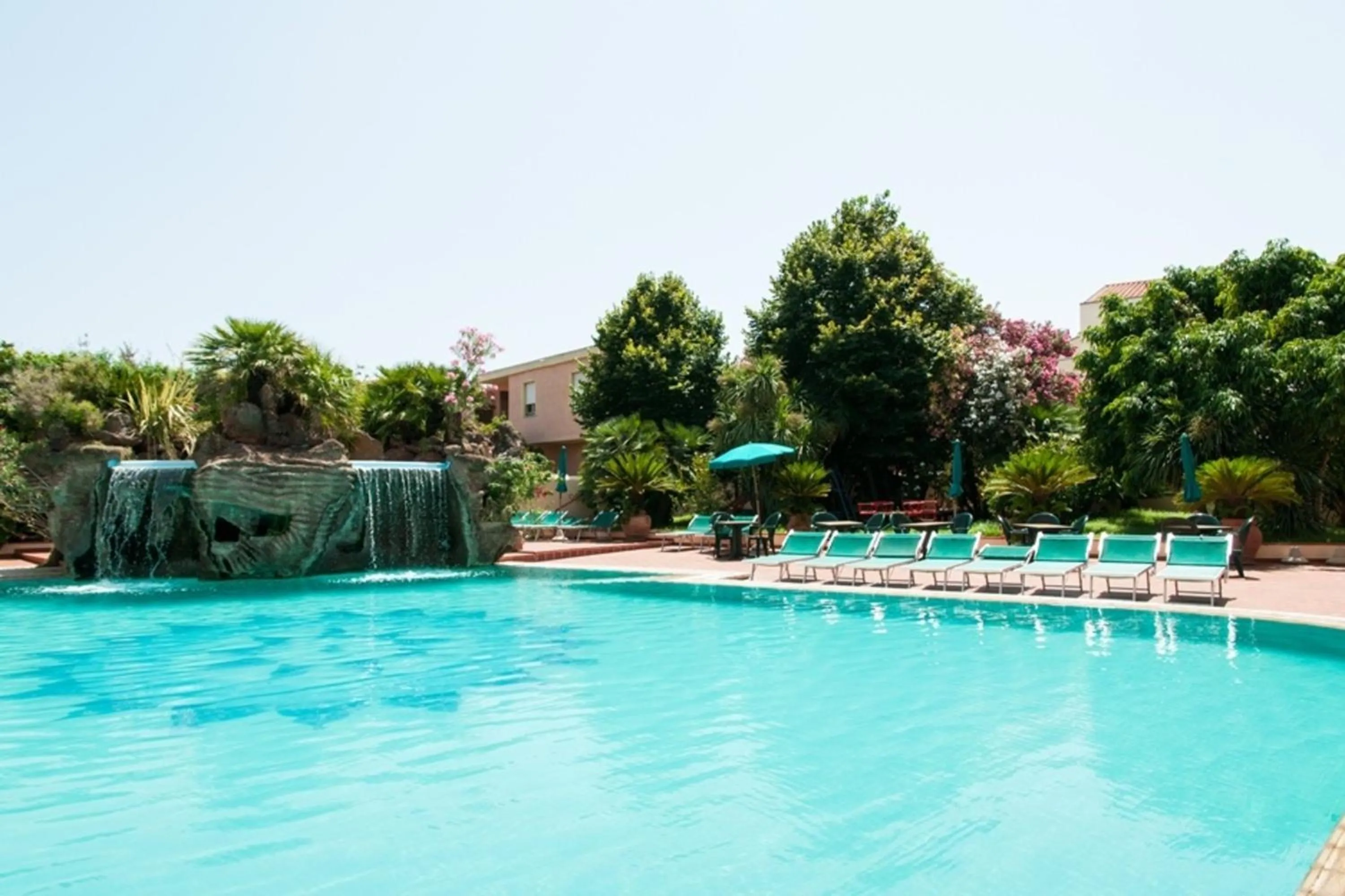 Swimming pool in Le Residenze Del Golfo Di Orosei Bilo 5 - Happy Rentals