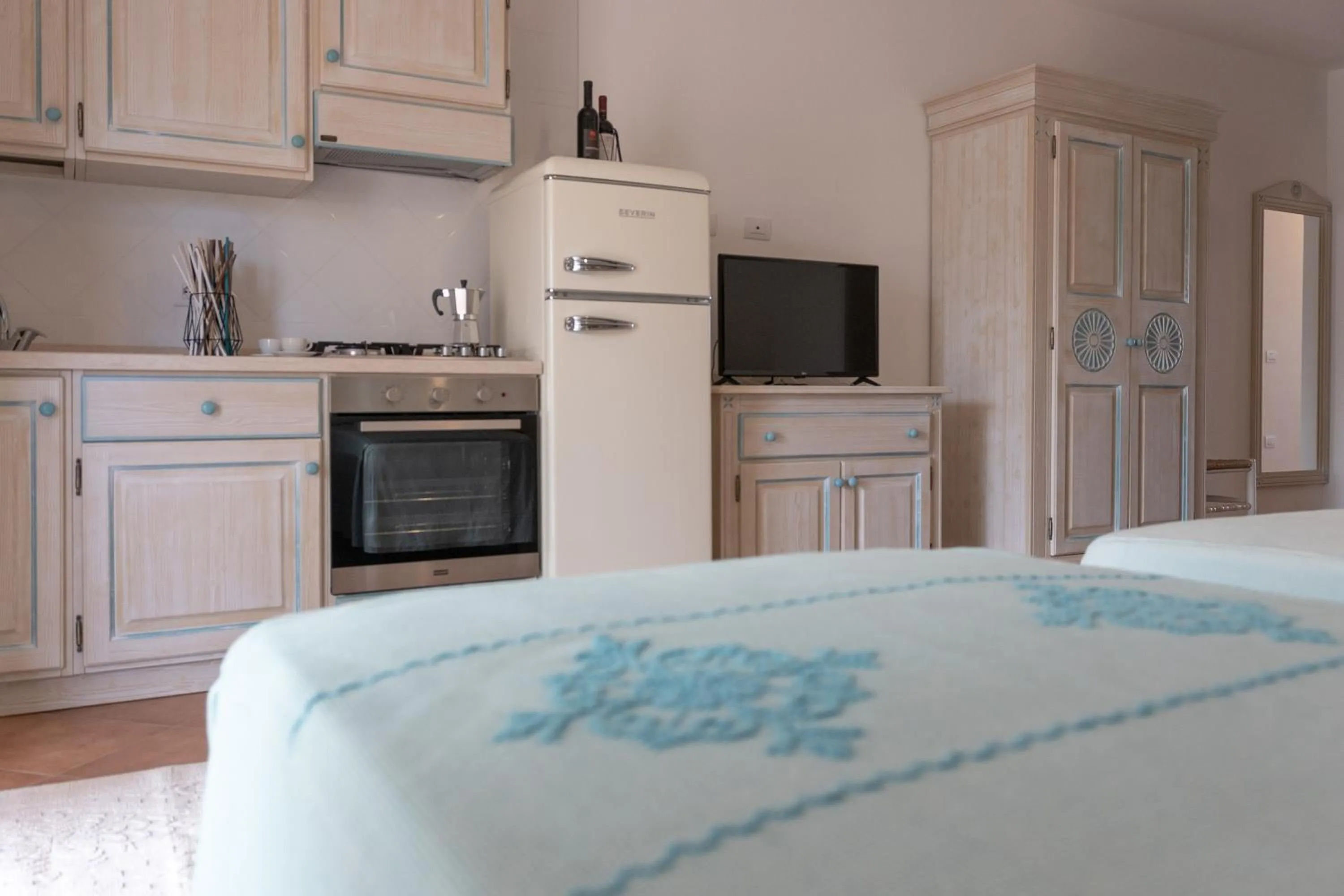 Bed in Le Residenze Del Golfo Di Orosei Bilo 5 - Happy Rentals