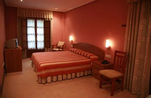 Photo of the whole room, Bed in Gran Hotel Rural Cela